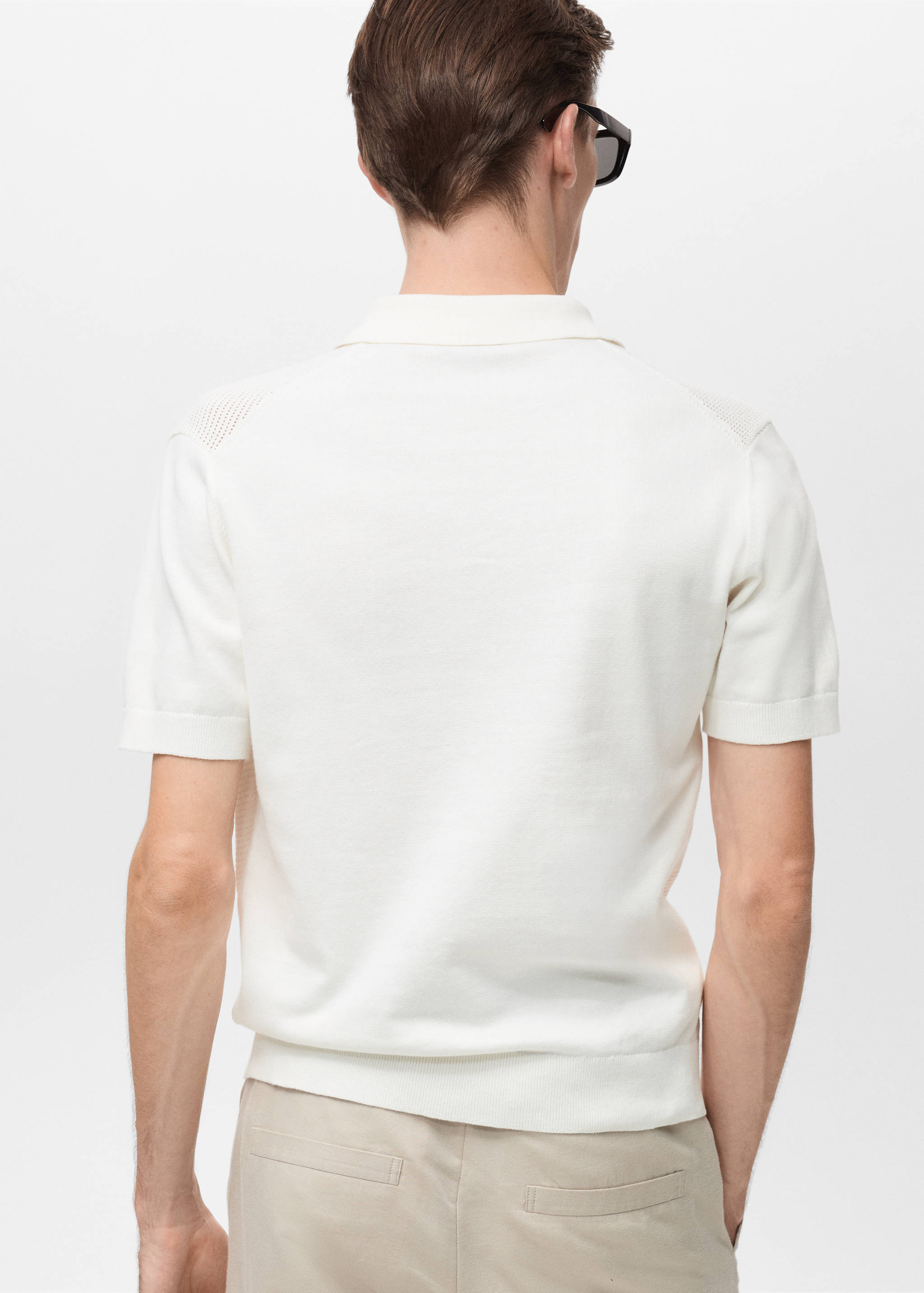 Openwork knitted polo shirt with zip - Reverse of the article