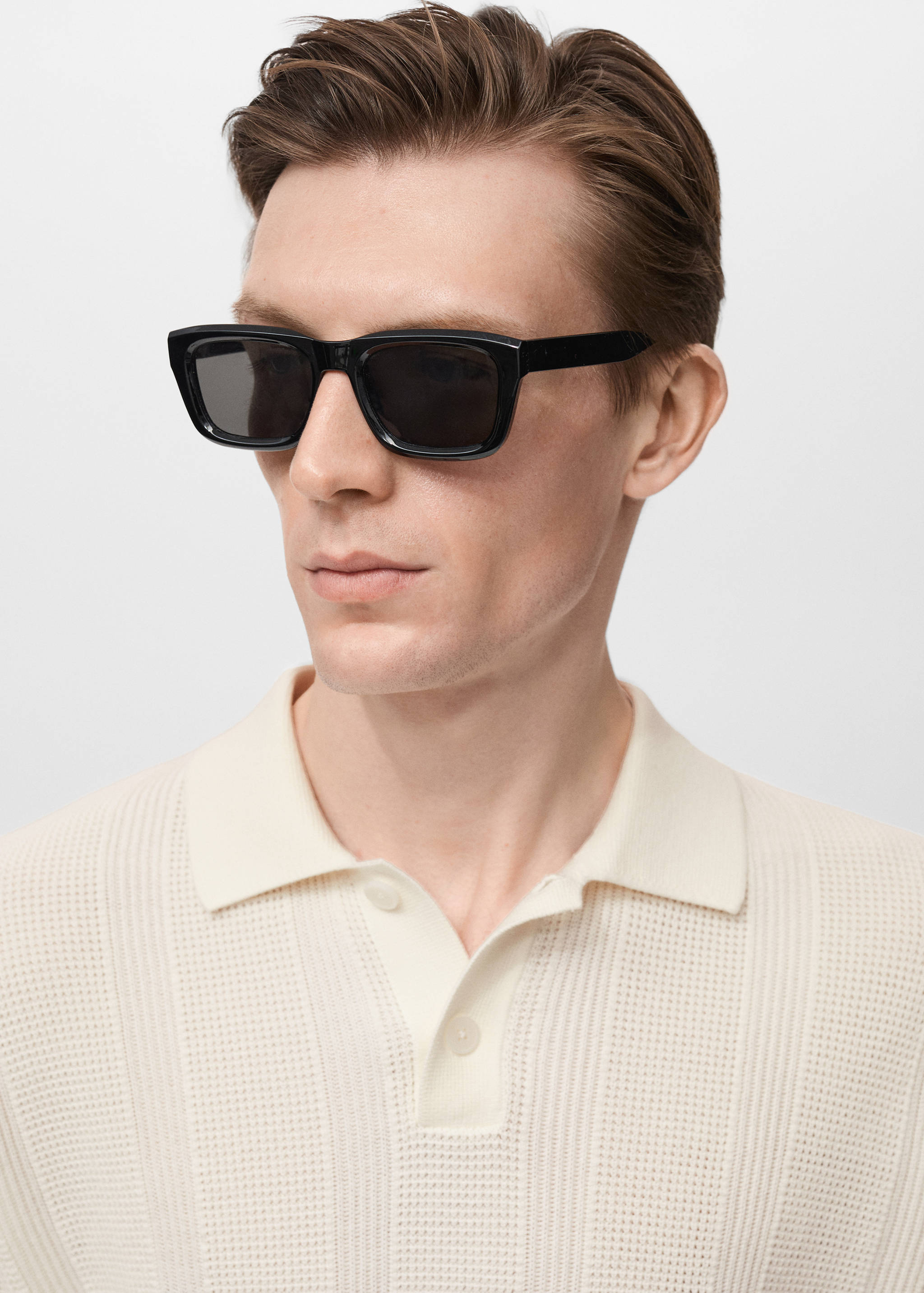Striped knitted polo shirt with lace accents - Details of the article 1