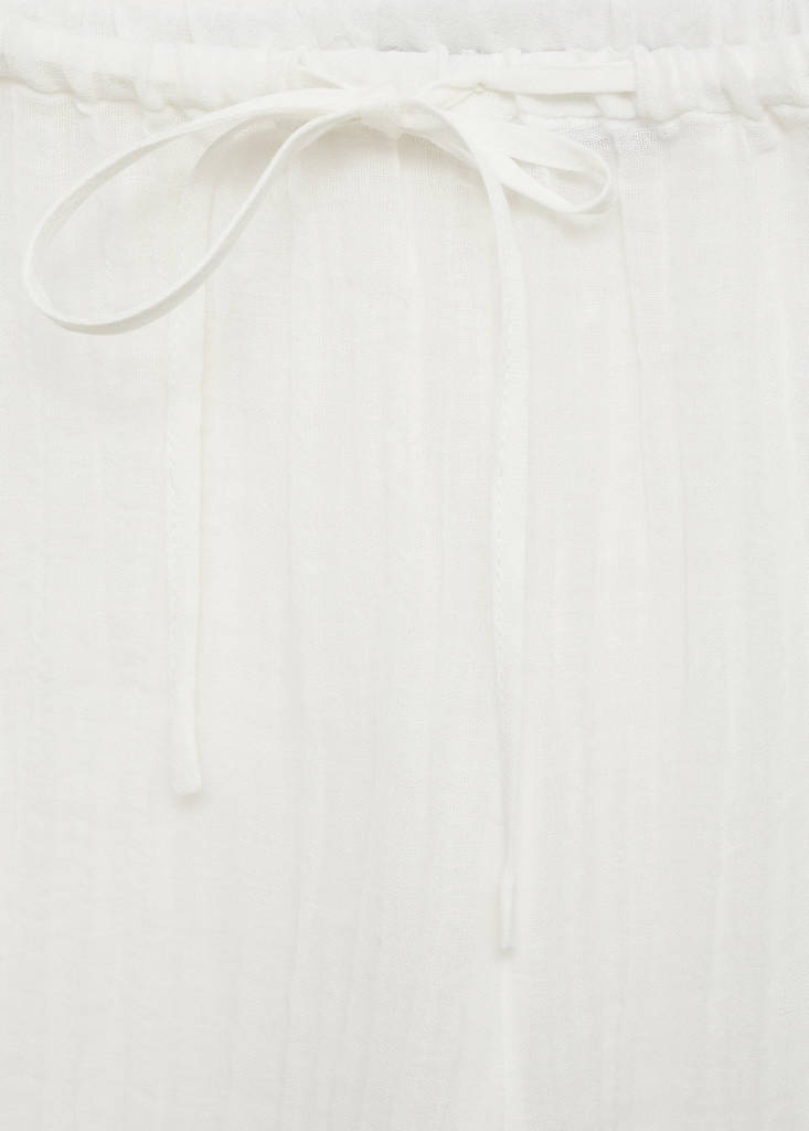 Fluid ramie trousers with bow — White