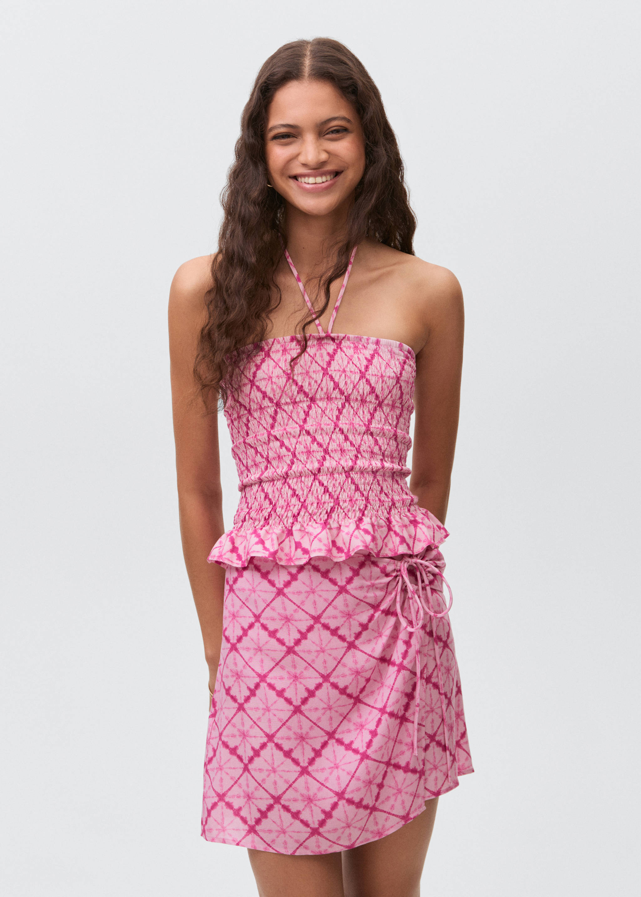 Falda cruzada estampada - Plano medio