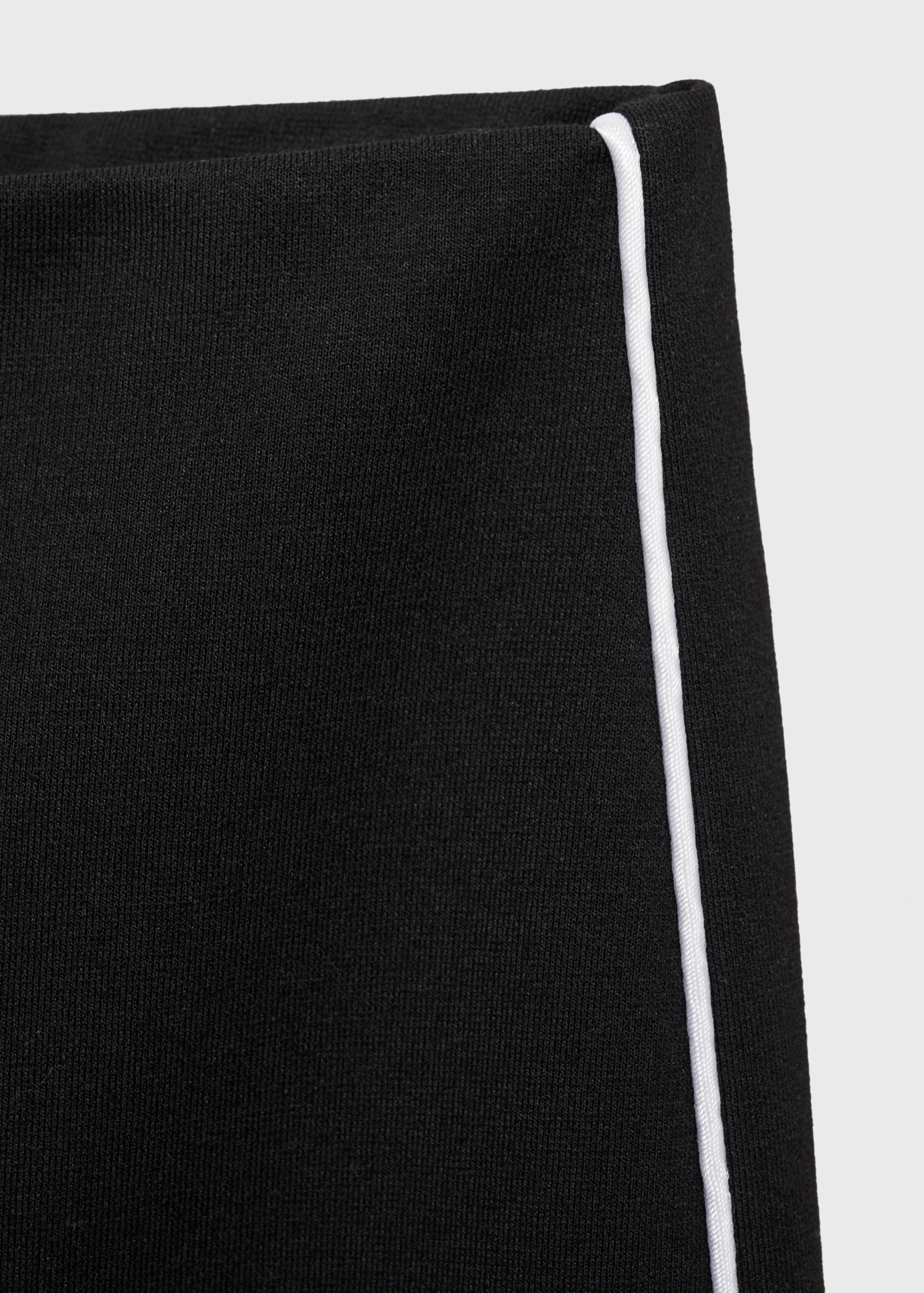 Knitted trousers with contrasting stripes - Details of the article 0