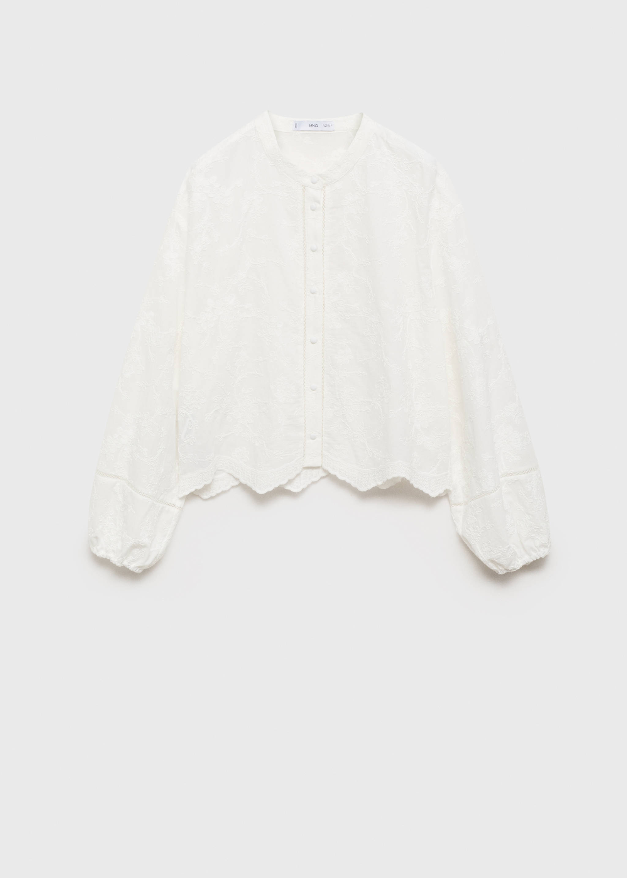 Cotton blouse with embroidered details - Article without model