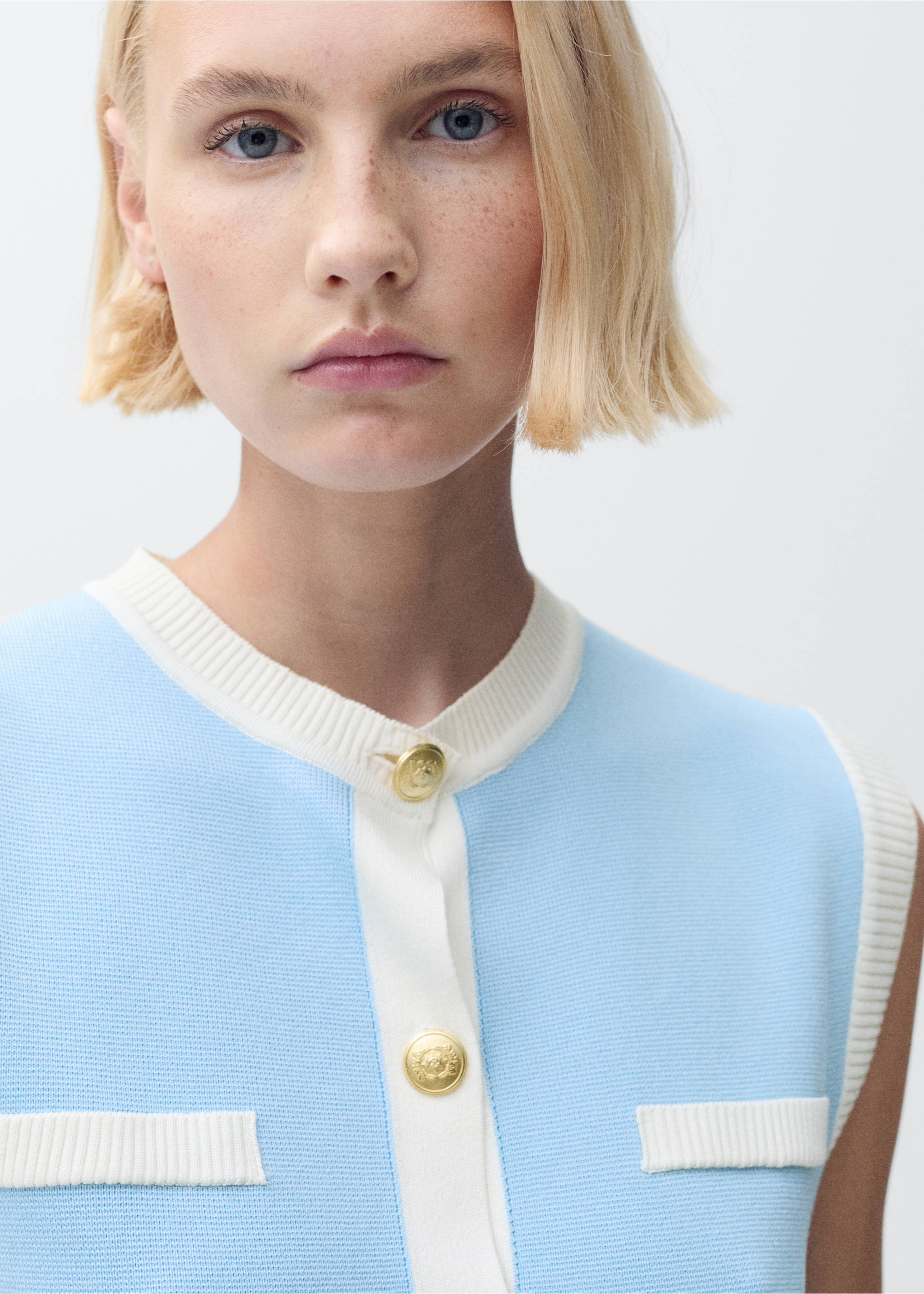 Knitted waistcoat with contrast piping - Details of the article 1, Turquoise. Ref: 87045763-00.
