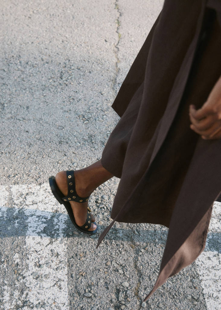 Strap sandals with buckles and eyelet details — Black
