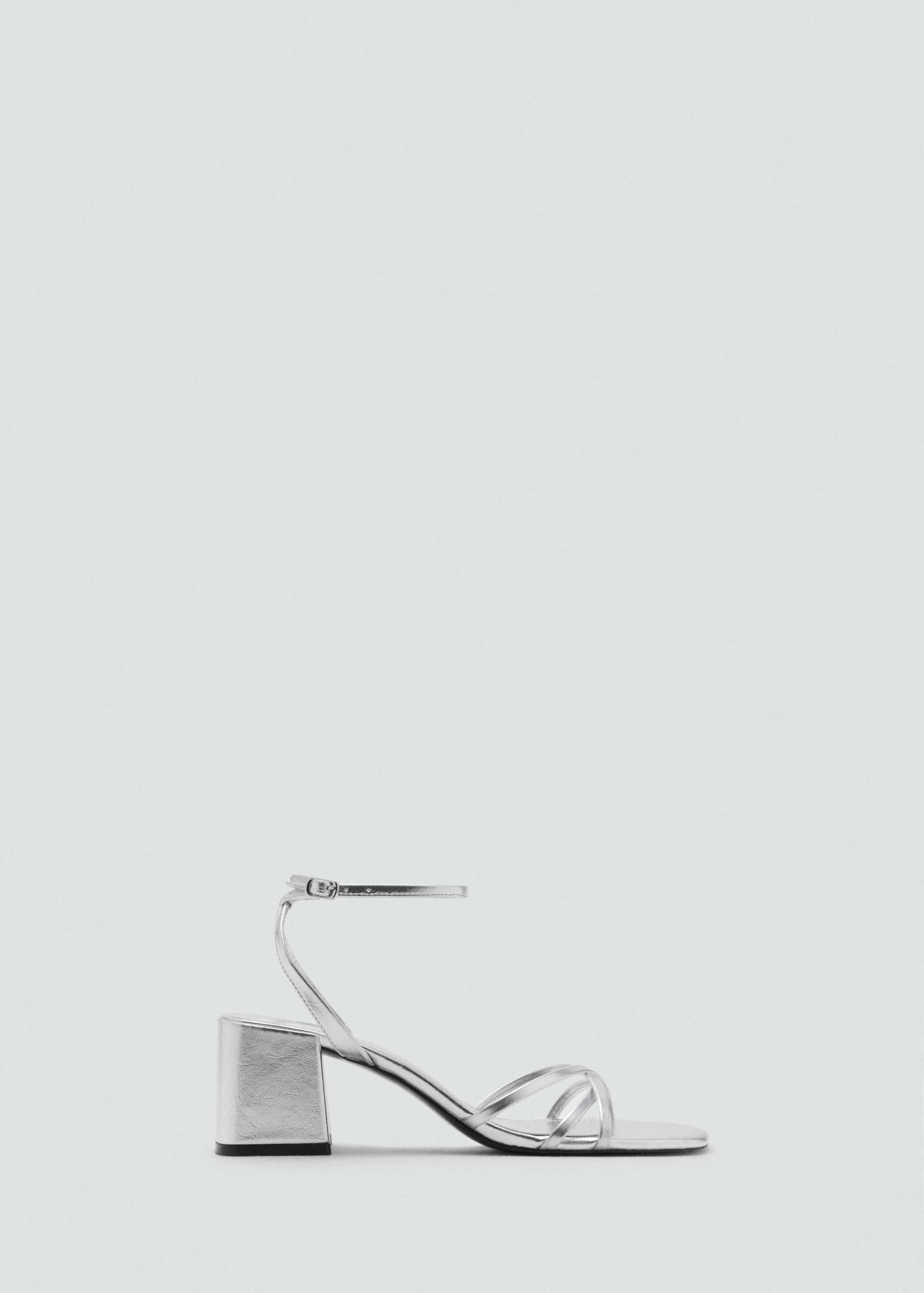 Heeled sandal with crossed straps - Article without model