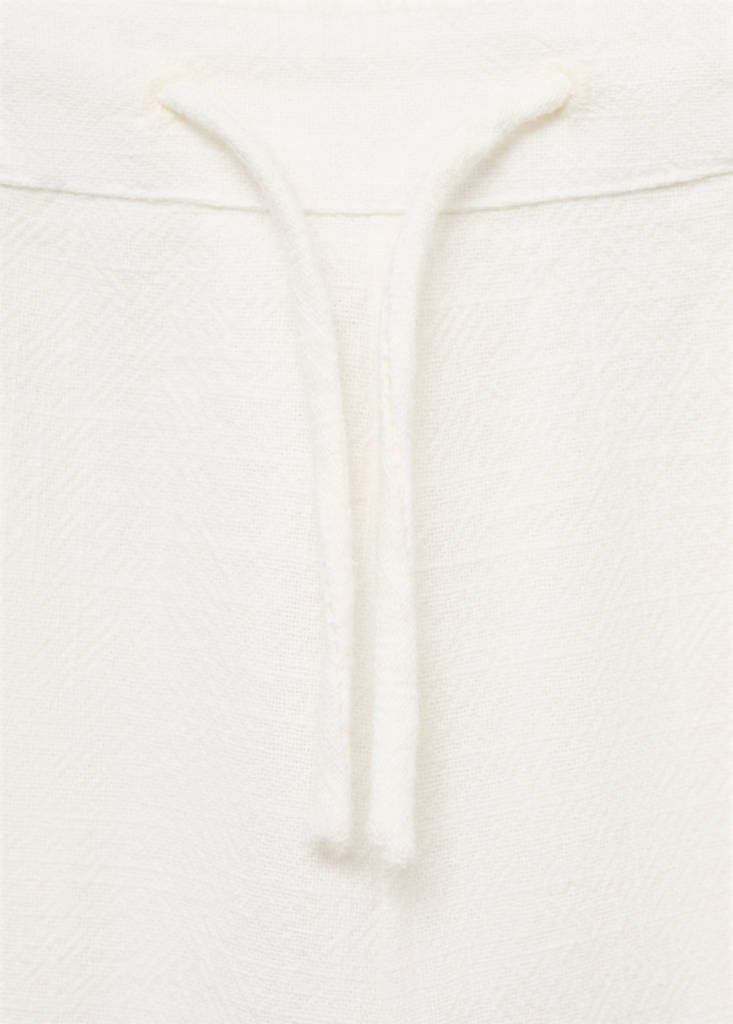 Swiss-embroidered trousers — Ecru
