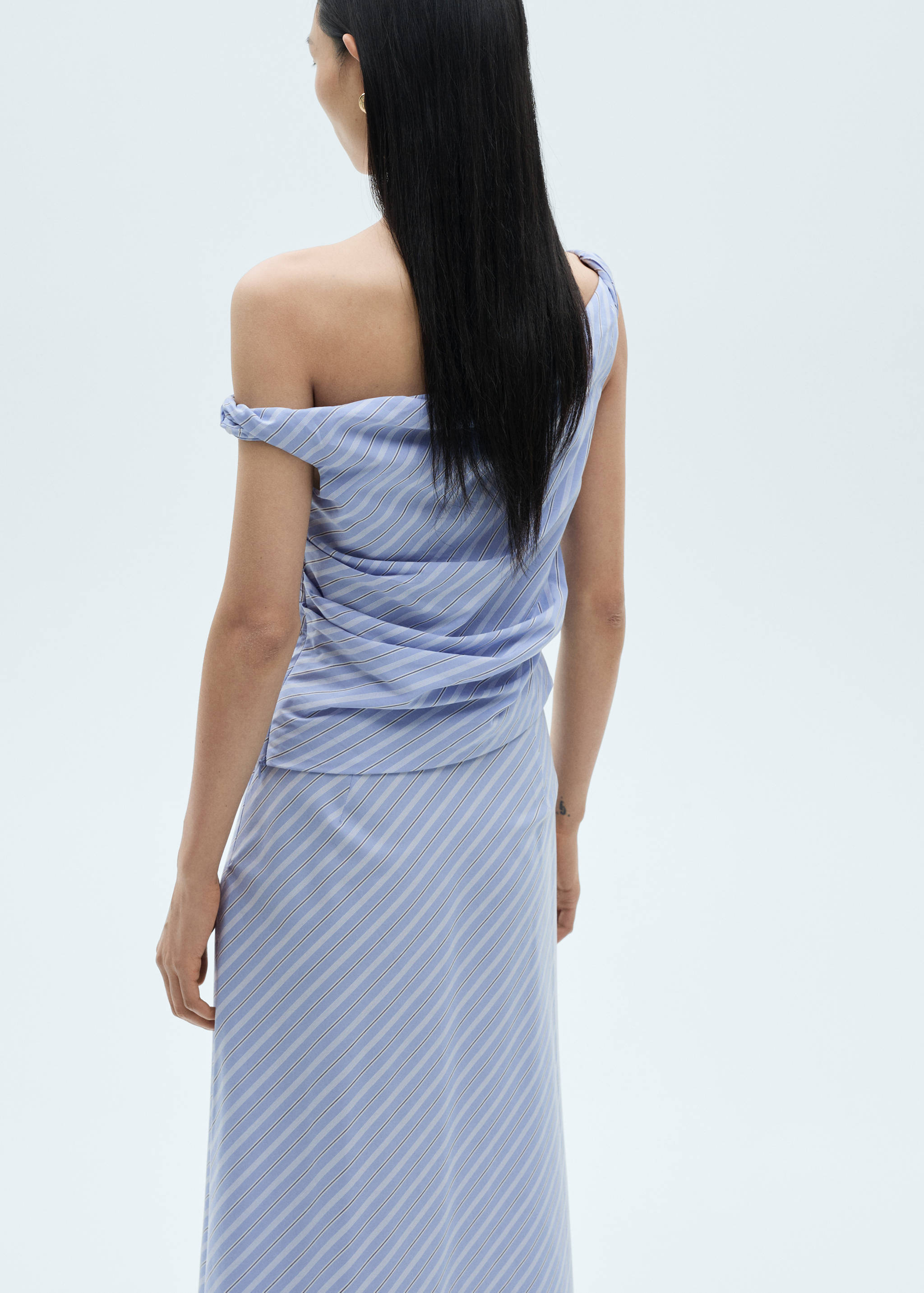 Striped draped asymmetric top - Reverse of the article