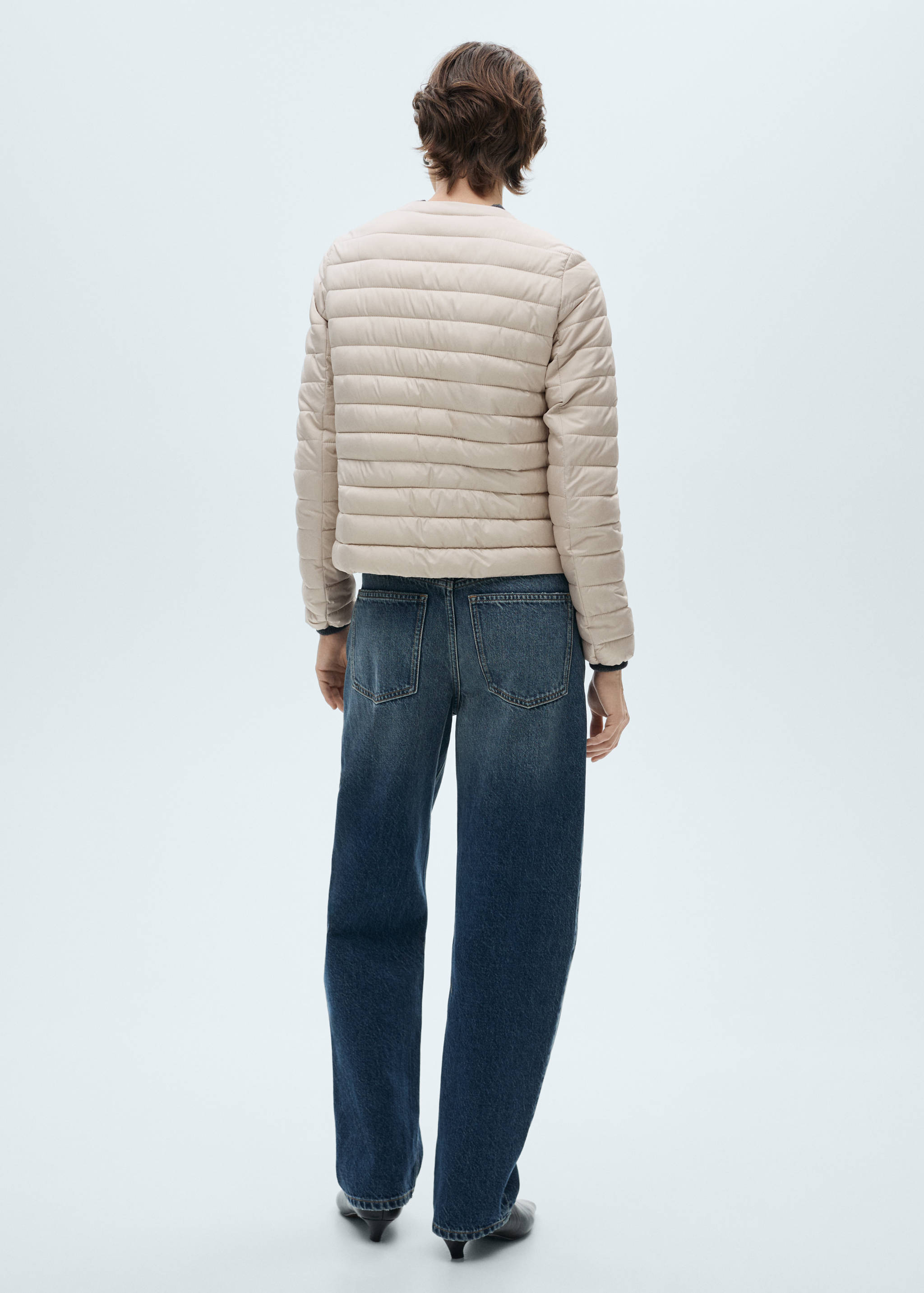 Short padded anorak with pockets - Reverse of the article