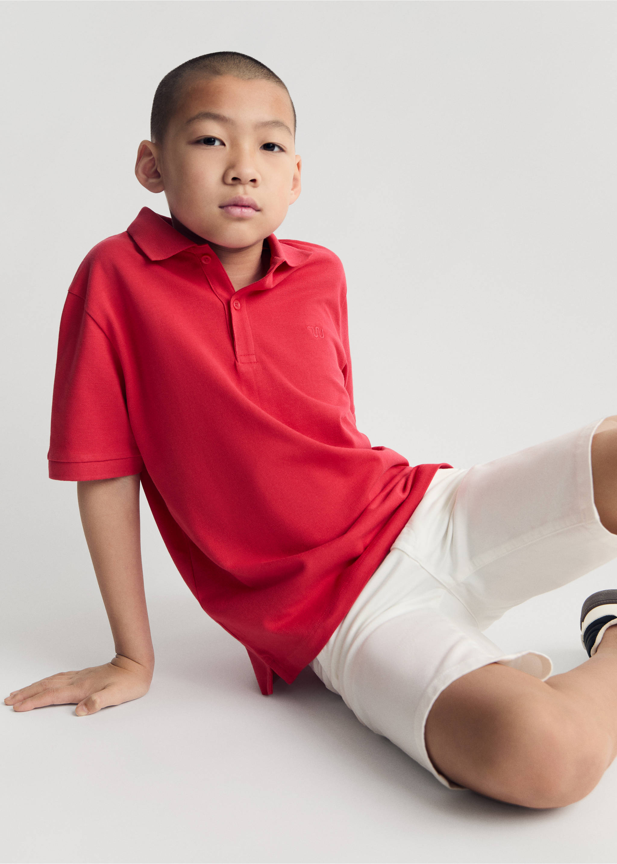 Short-sleeved cotton polo shirt - Details of the article 2, Red. Ref: 87050630-00.