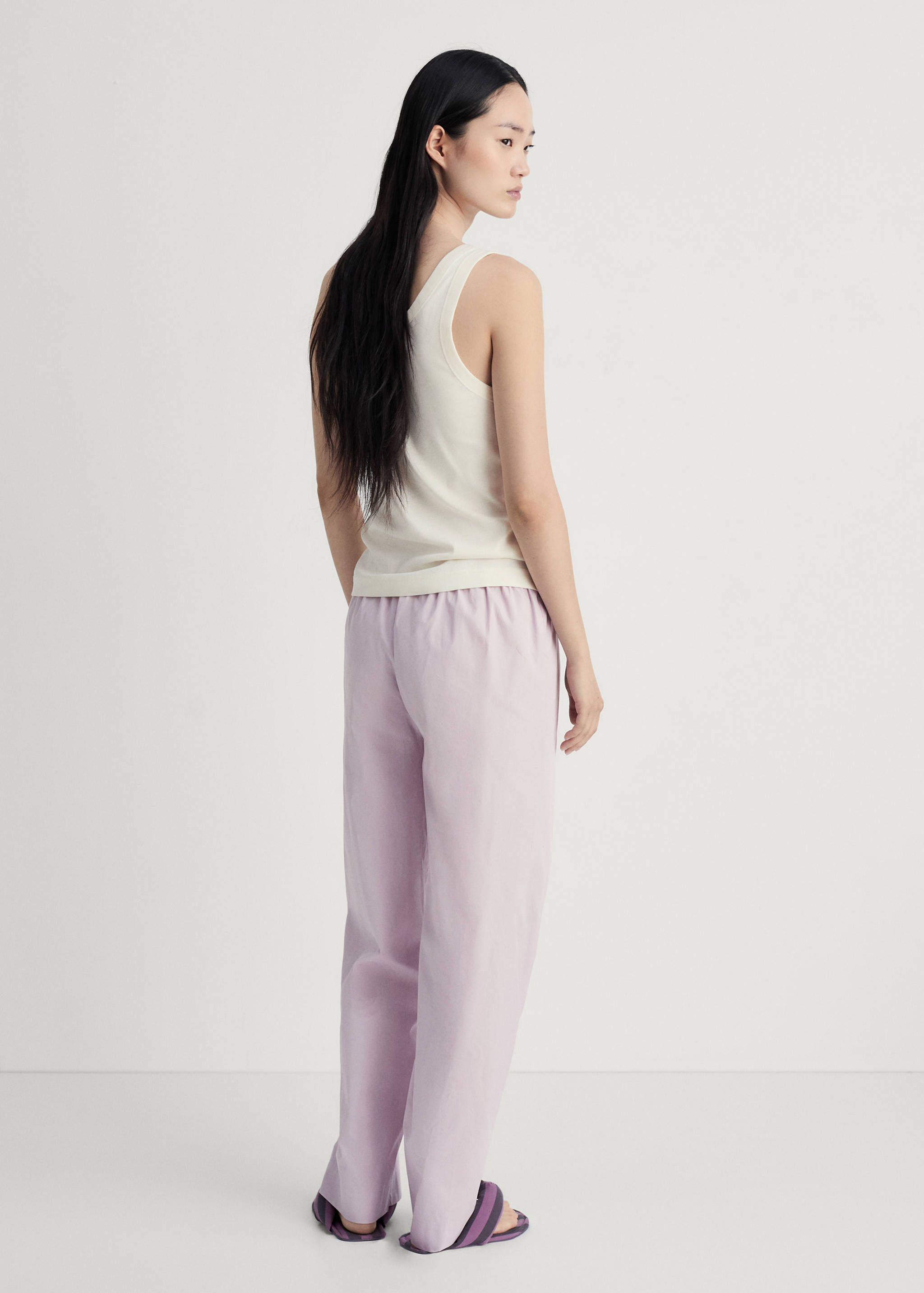 Garment-washed cotton pants - Reverse of the article