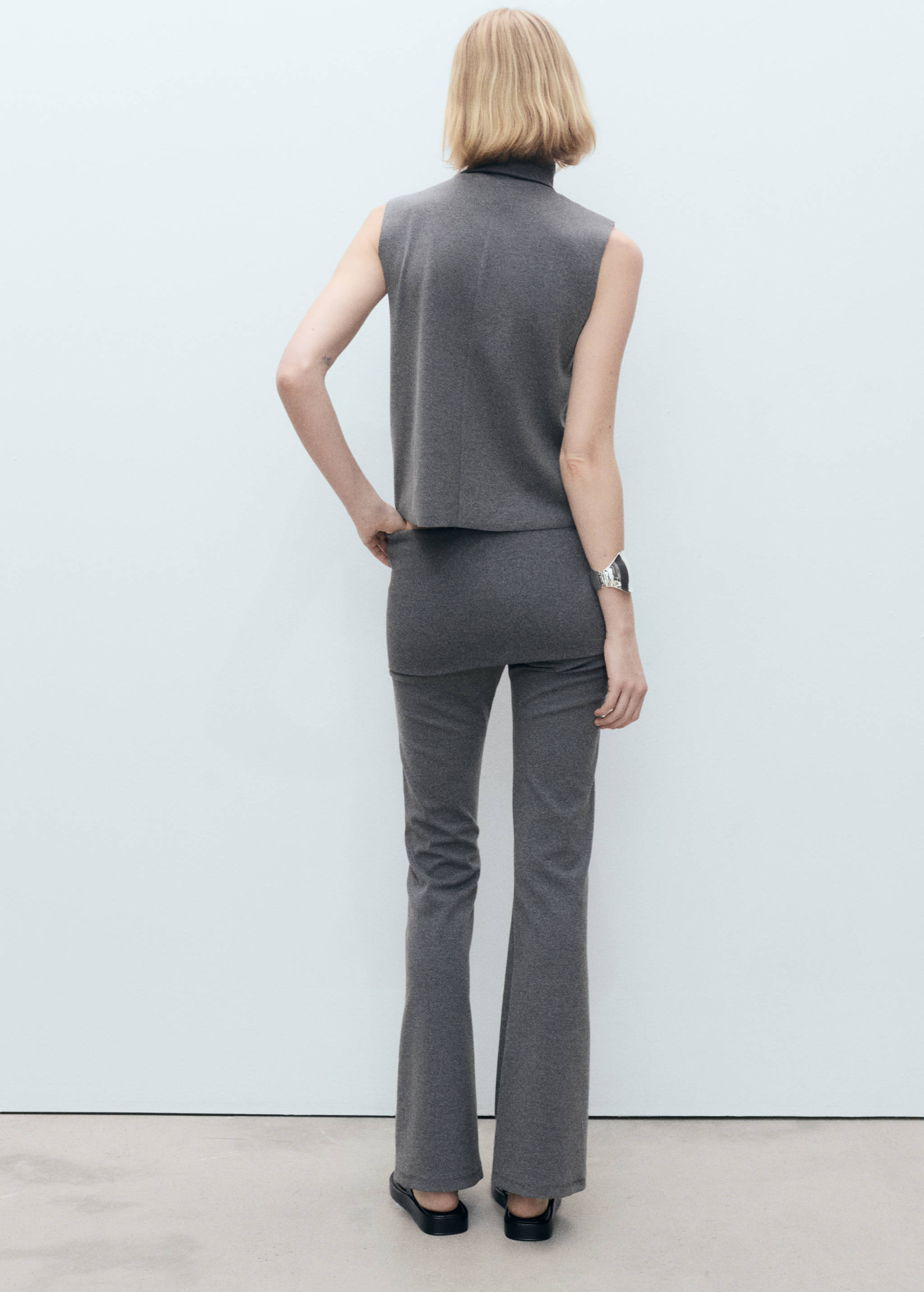 Flared pants with turn-up waist - Reverse of the article