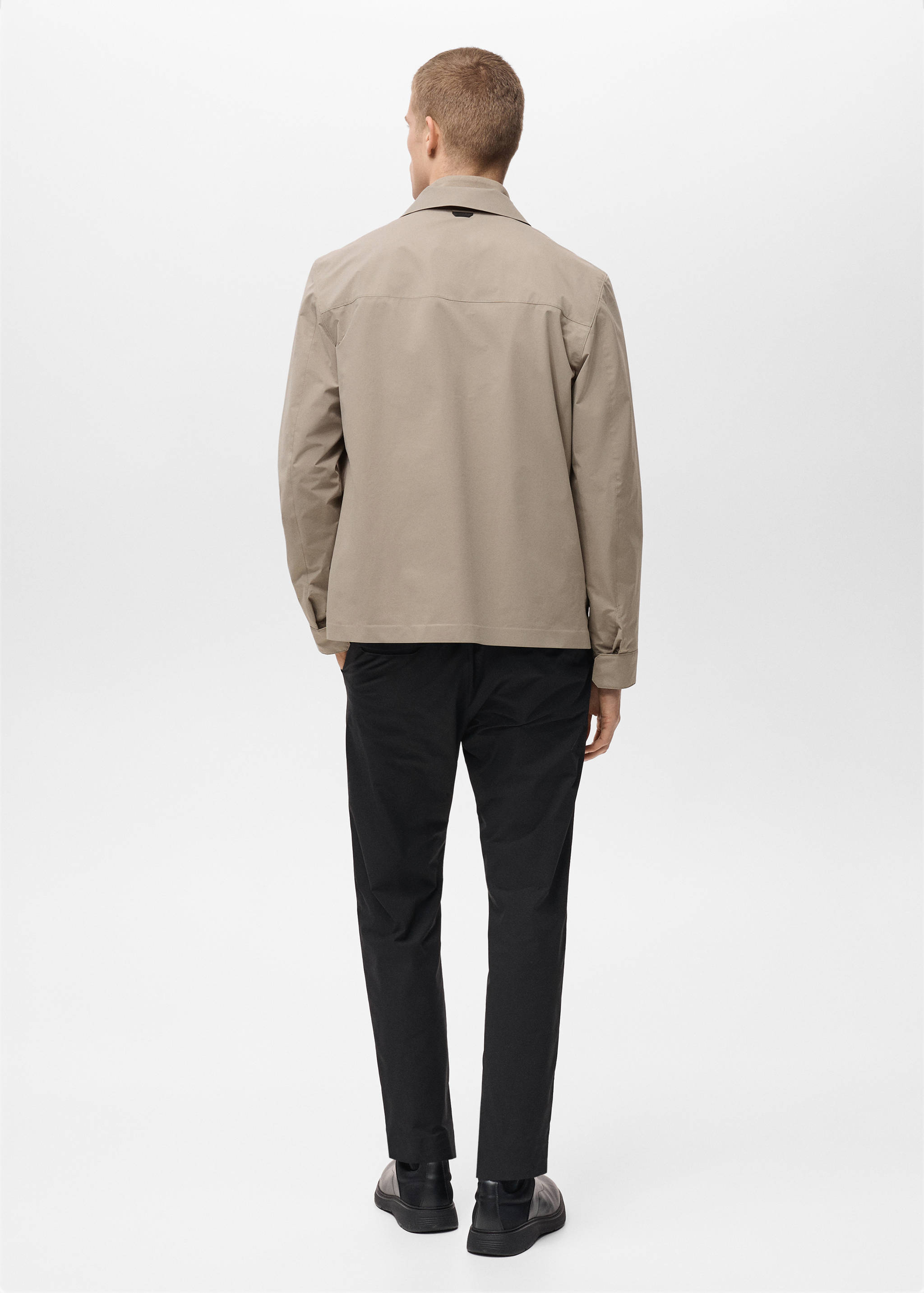 Water-repellent jacket with pockets - Reverse of the article