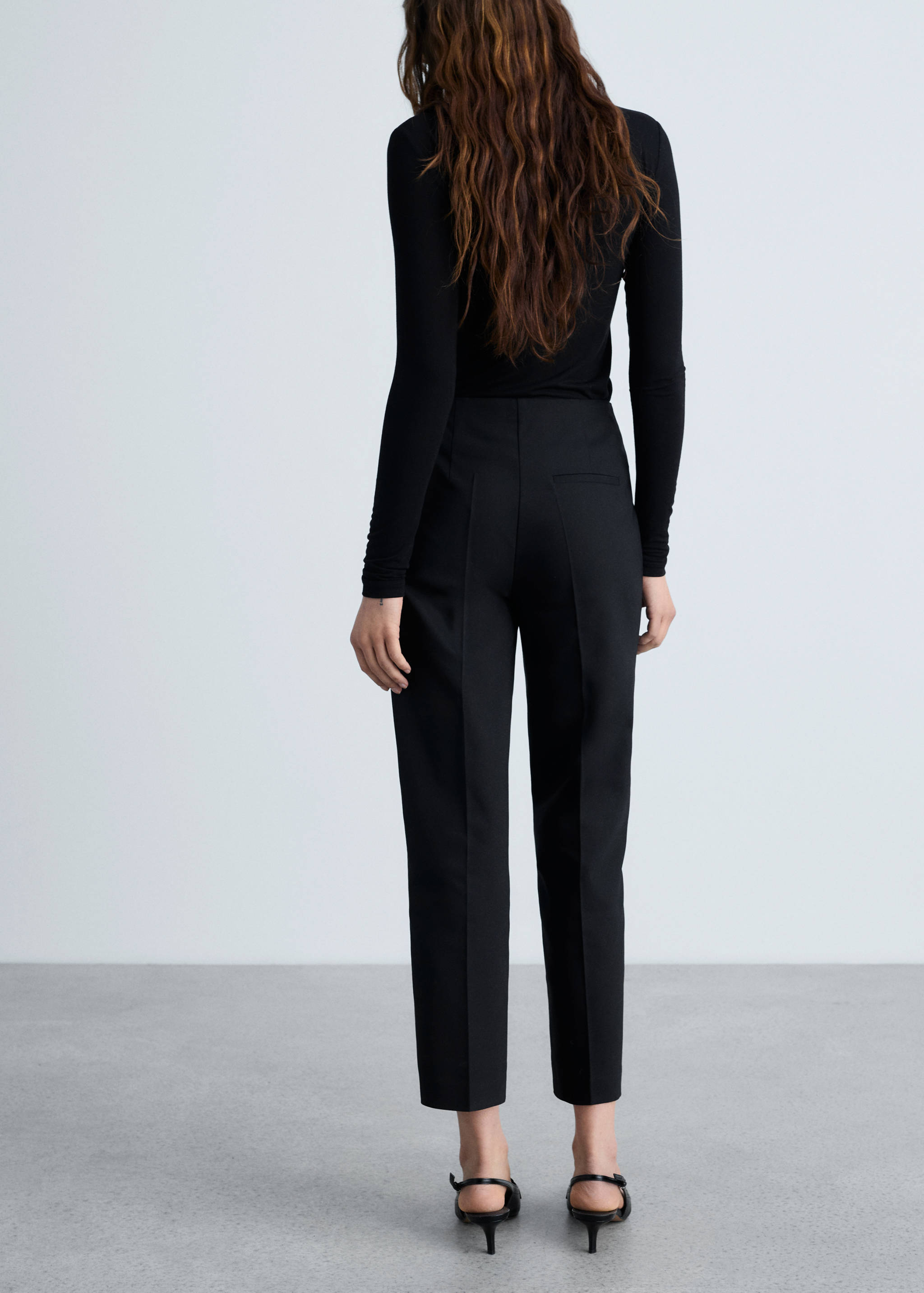 Straight pants with jewel buttons - Reverse of the article