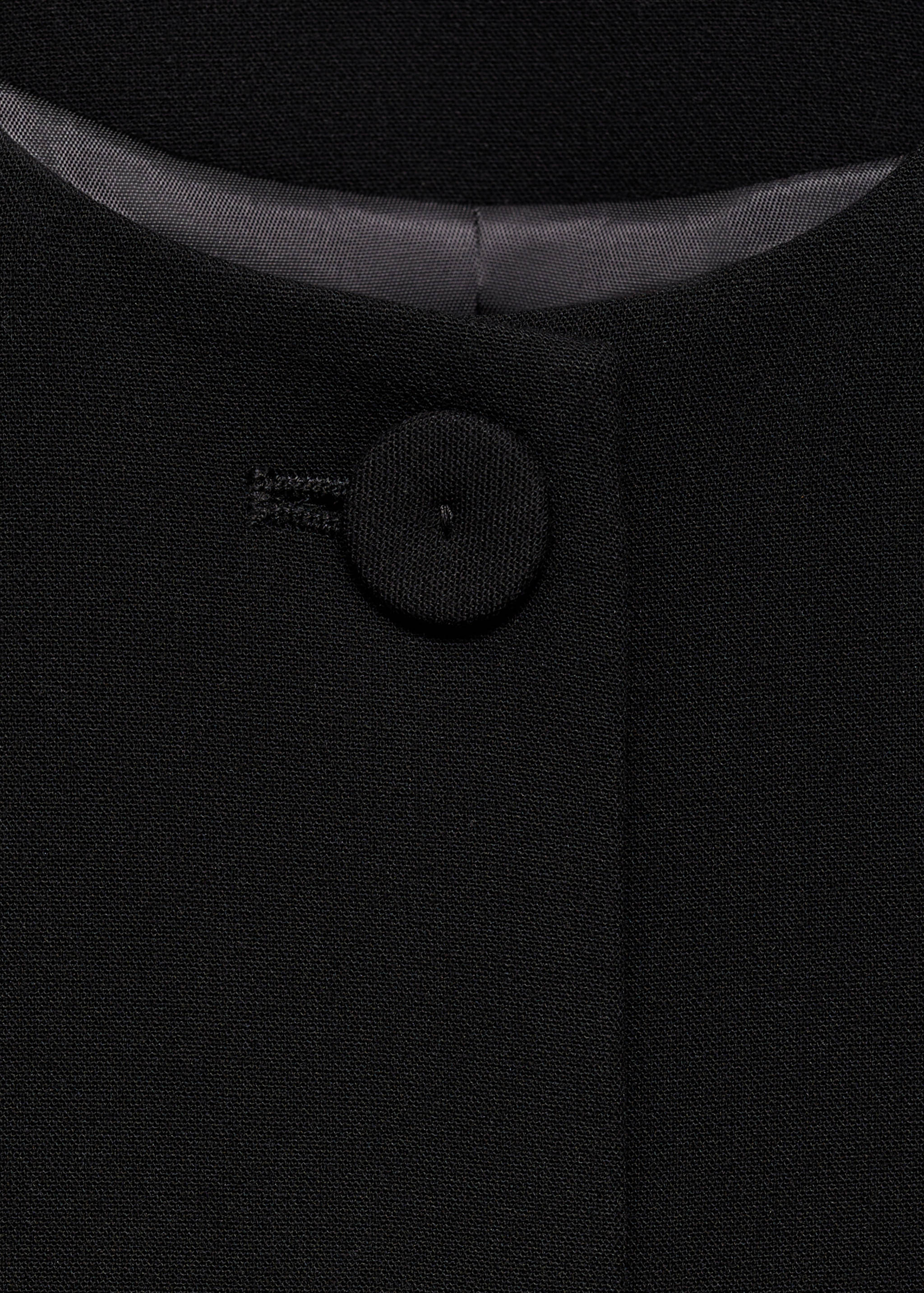 Colete de fato com botões - Pormenor do artigo 8