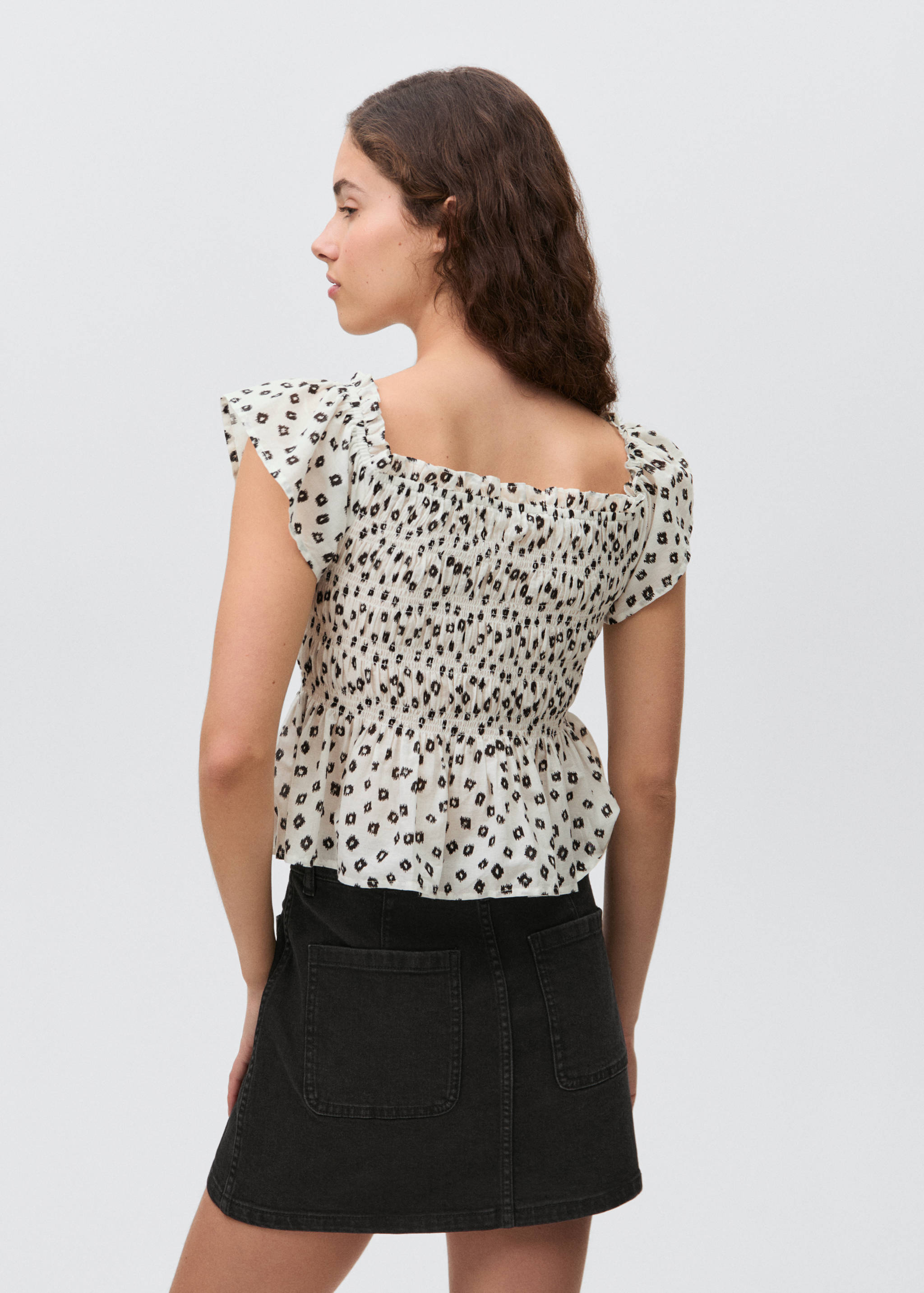 Mini-Jeansrock mit Taschen - Rückseite des Artikels