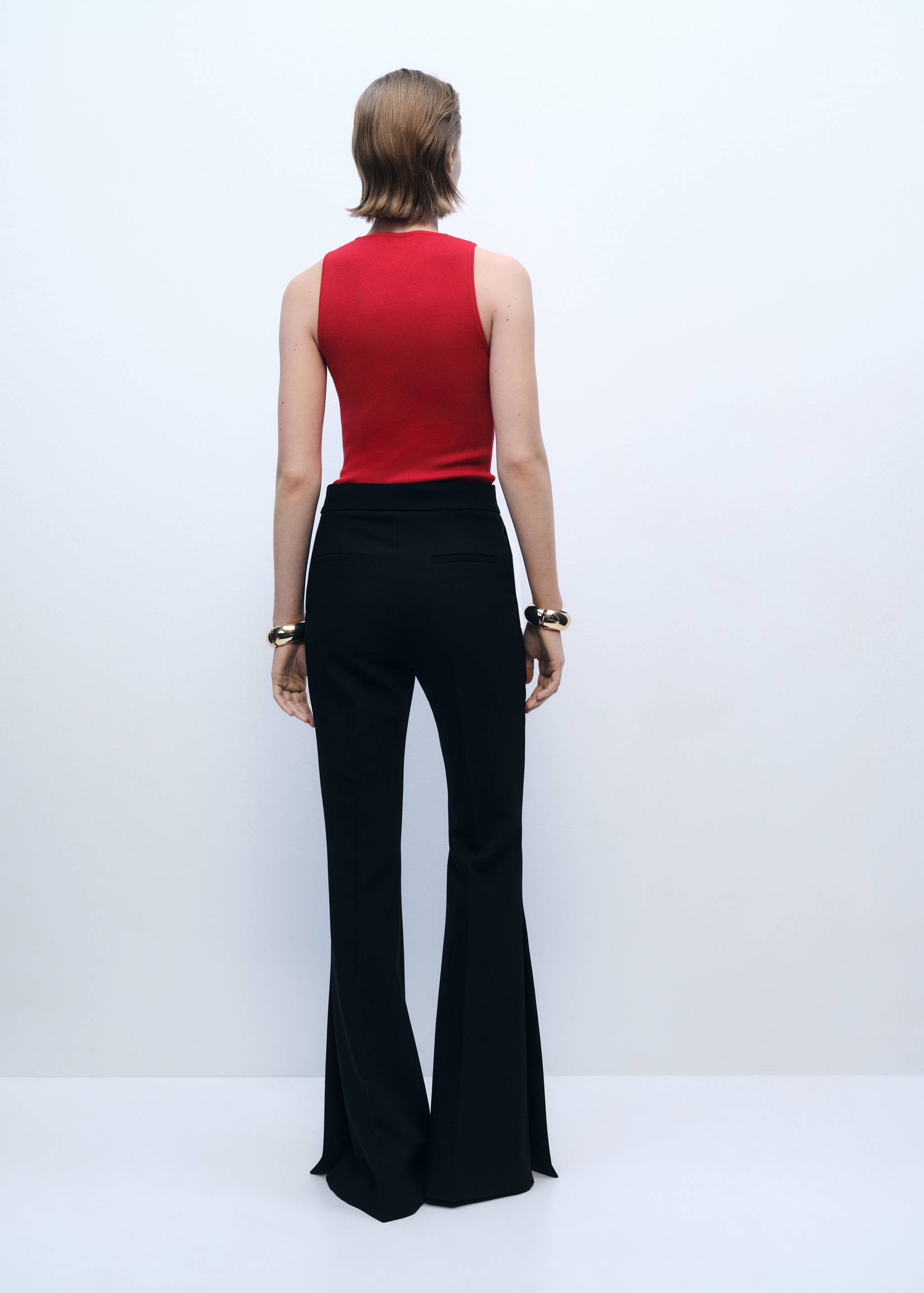 Sleeveless fitted knitted top - Reverse of the article