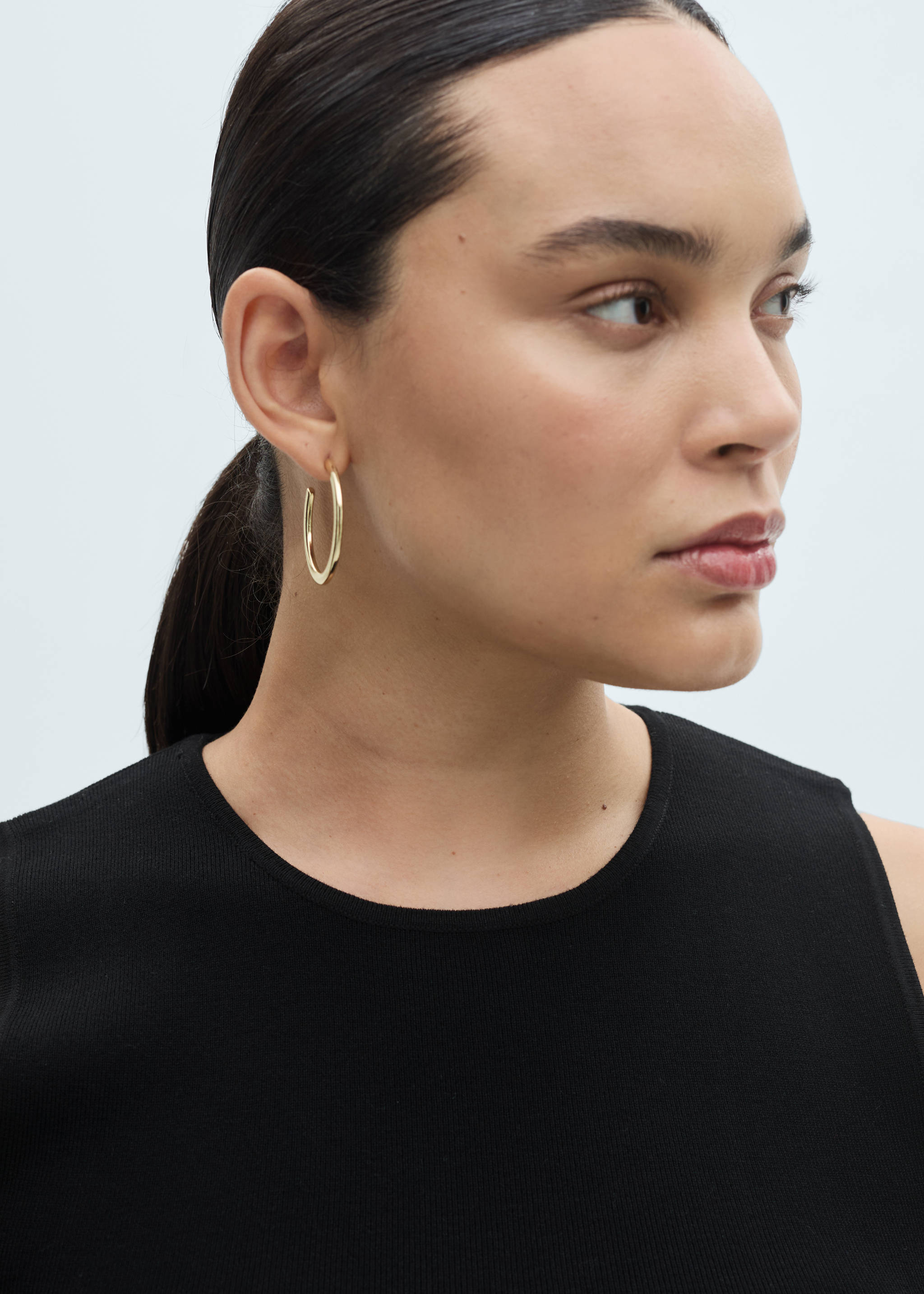 Top z dzianiny o taliowanym kroju bez rękawów - Szczegóły artykułu 4