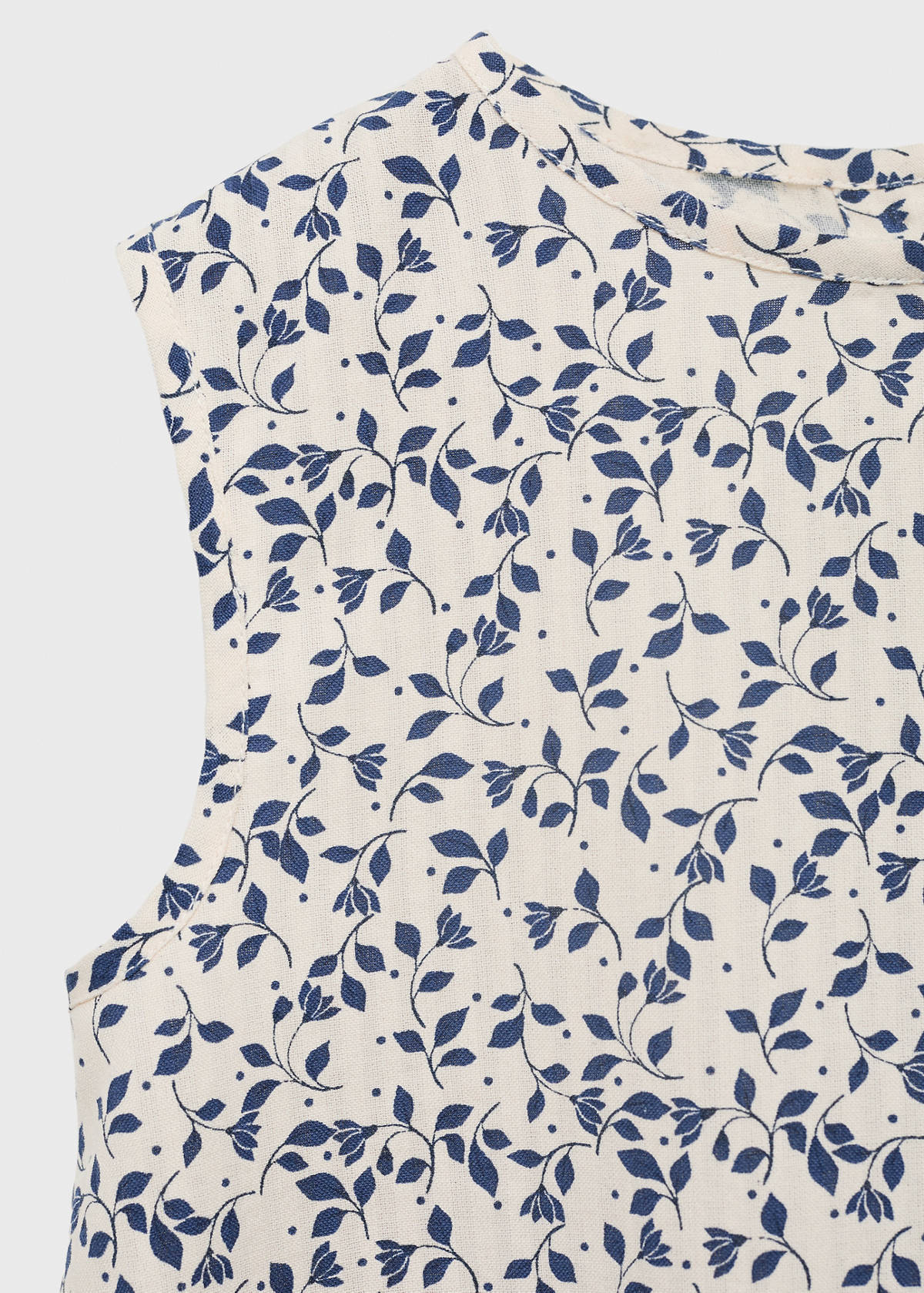 Sleeveless printed blouse — White