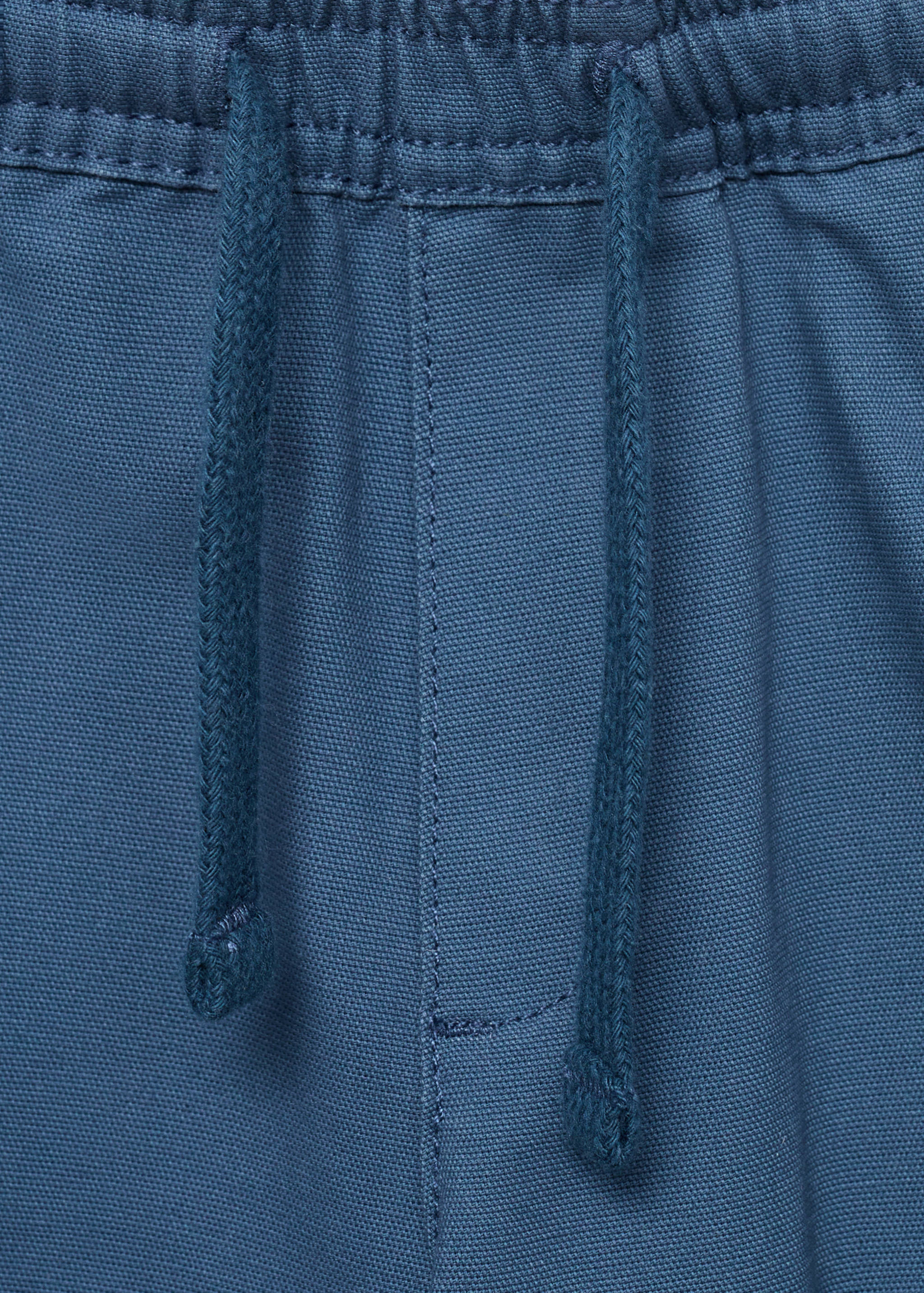 Cargo pockets Bermuda shorts - Details of the article 8