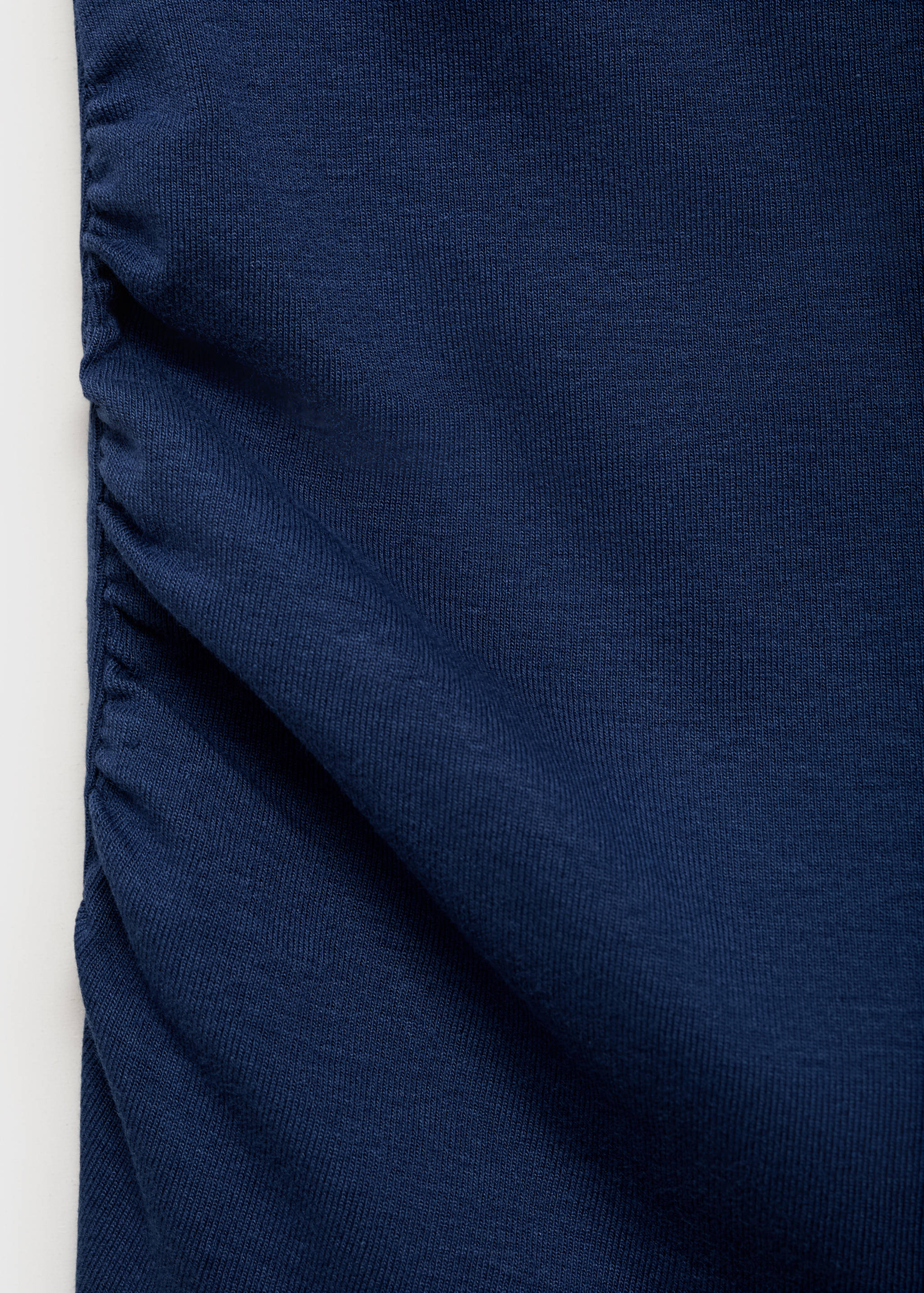 Too assimétrico e drapeado - Pormenor do artigo 8