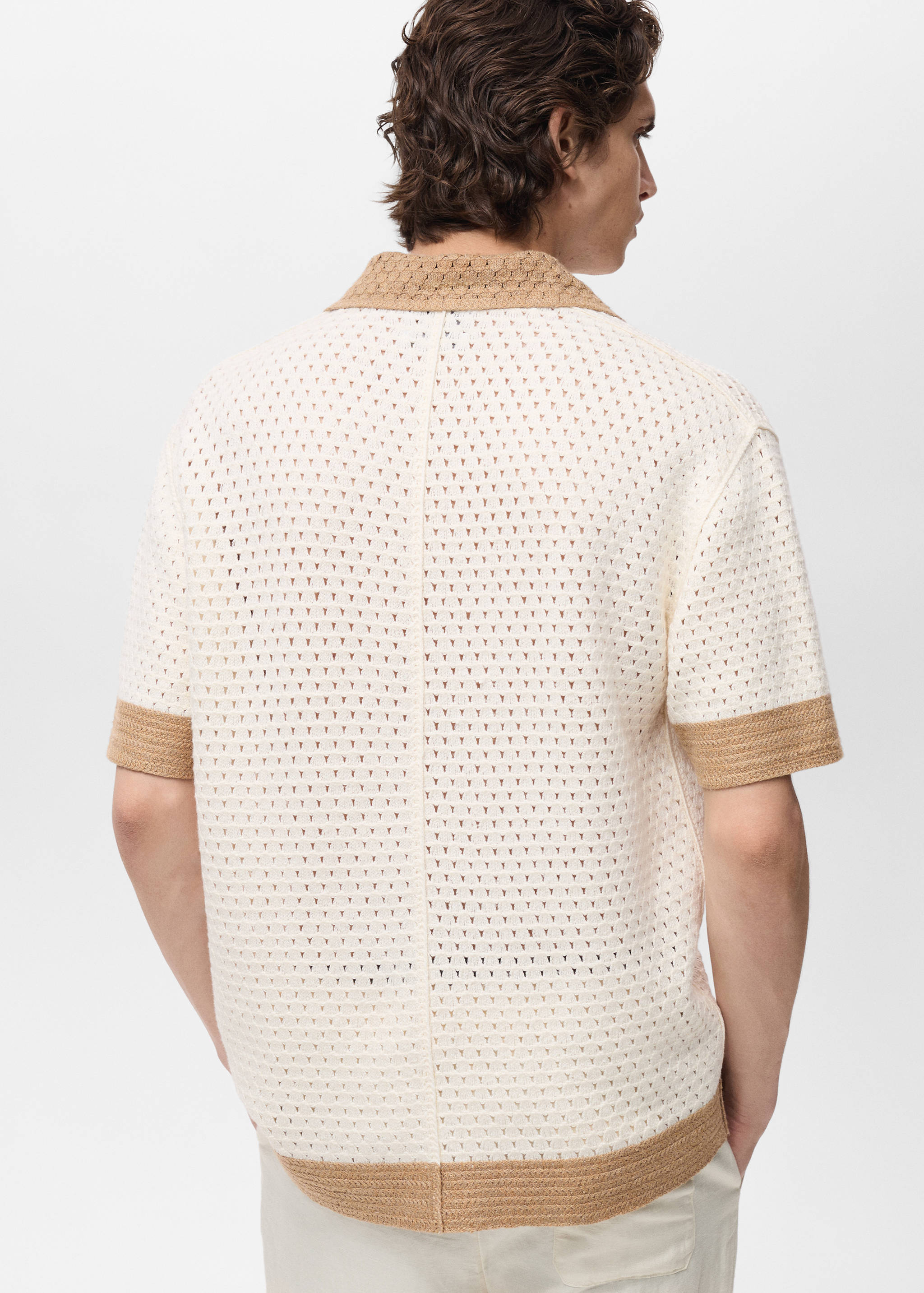 Knitted polo shirt with contrasting lace details - Reverse of the article