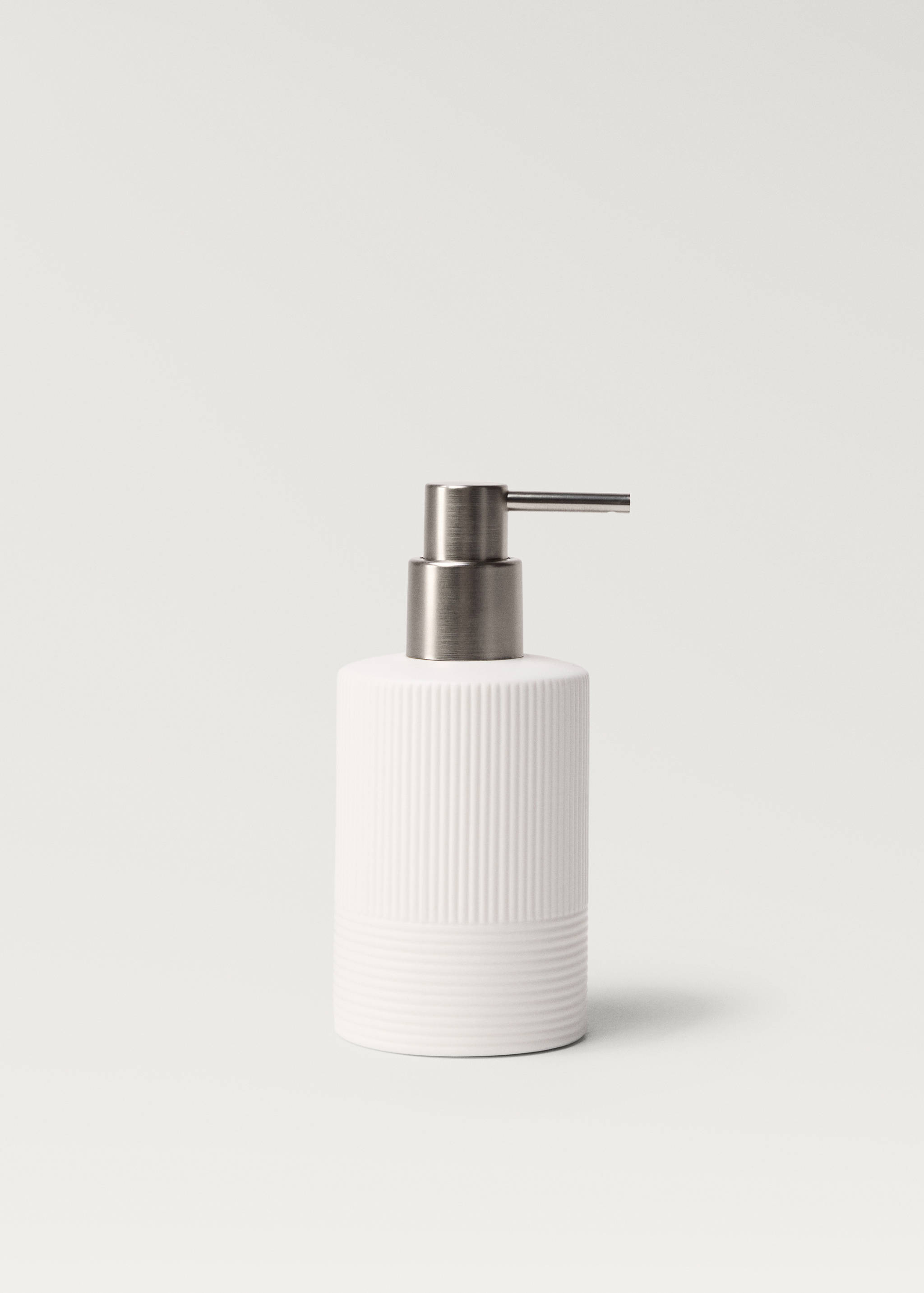 Stoneware soap dispenser with relief - Article without model