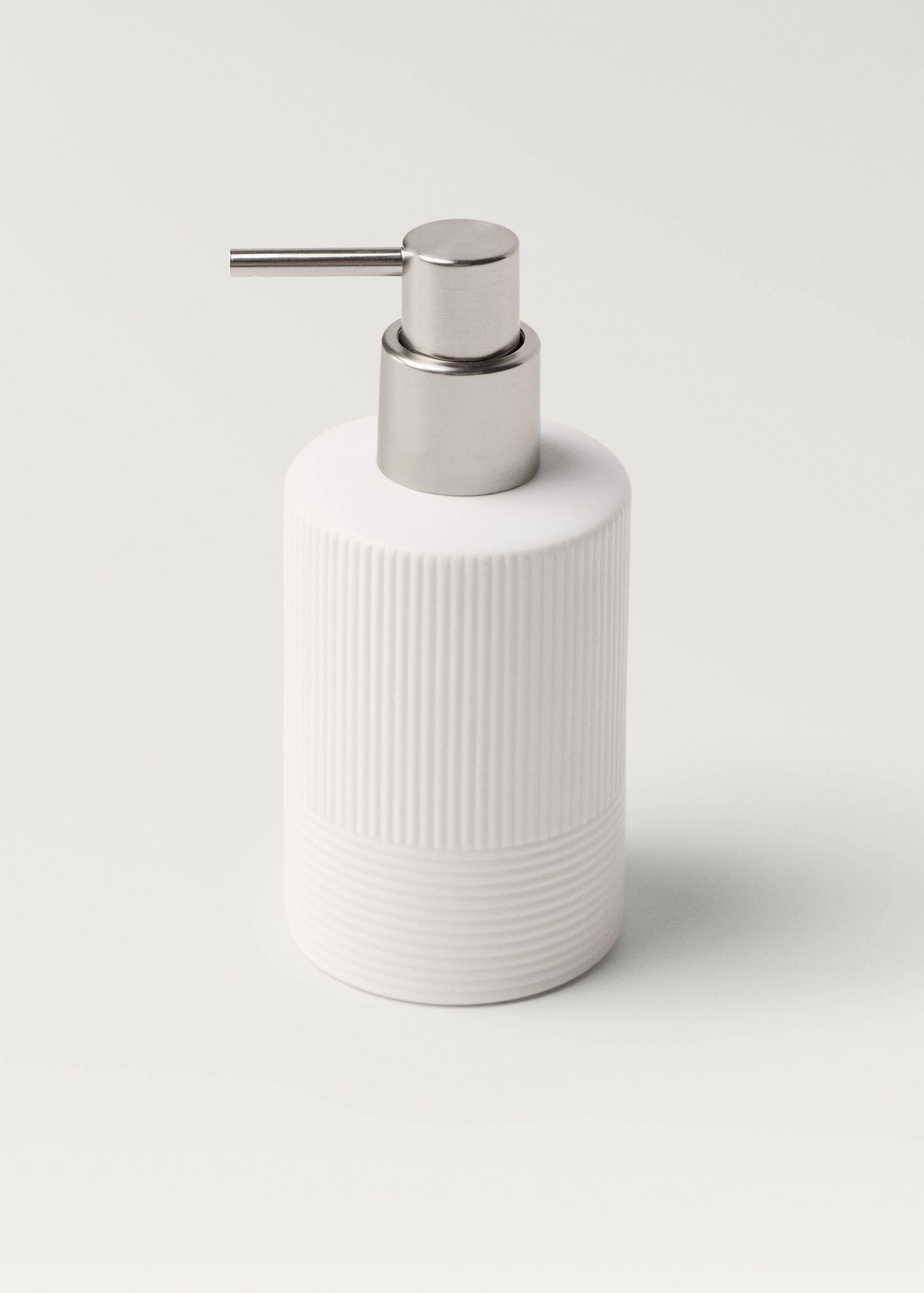 Stoneware soap dispenser with relief - Details of the article 1