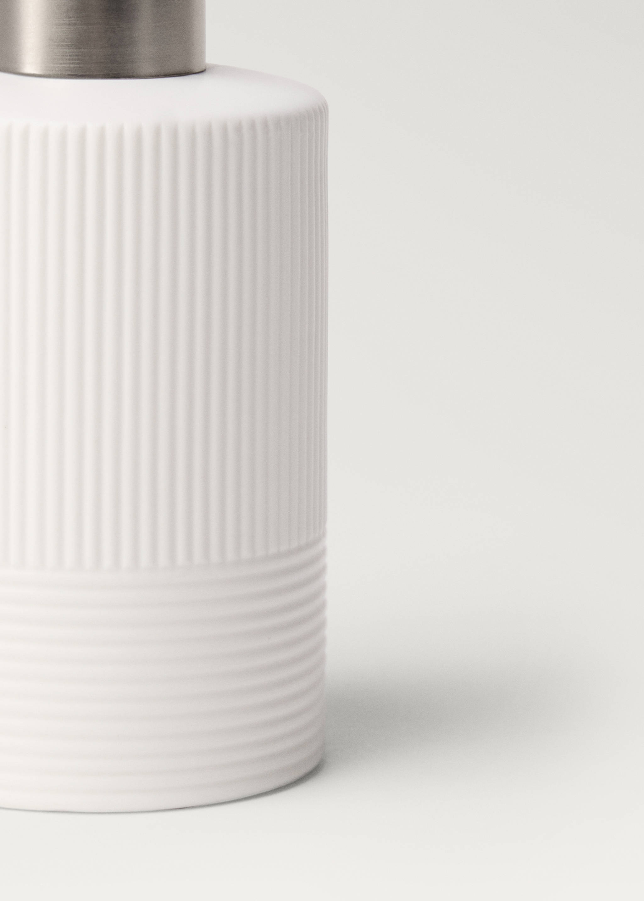 Stoneware soap dispenser with relief - Details of the article 2