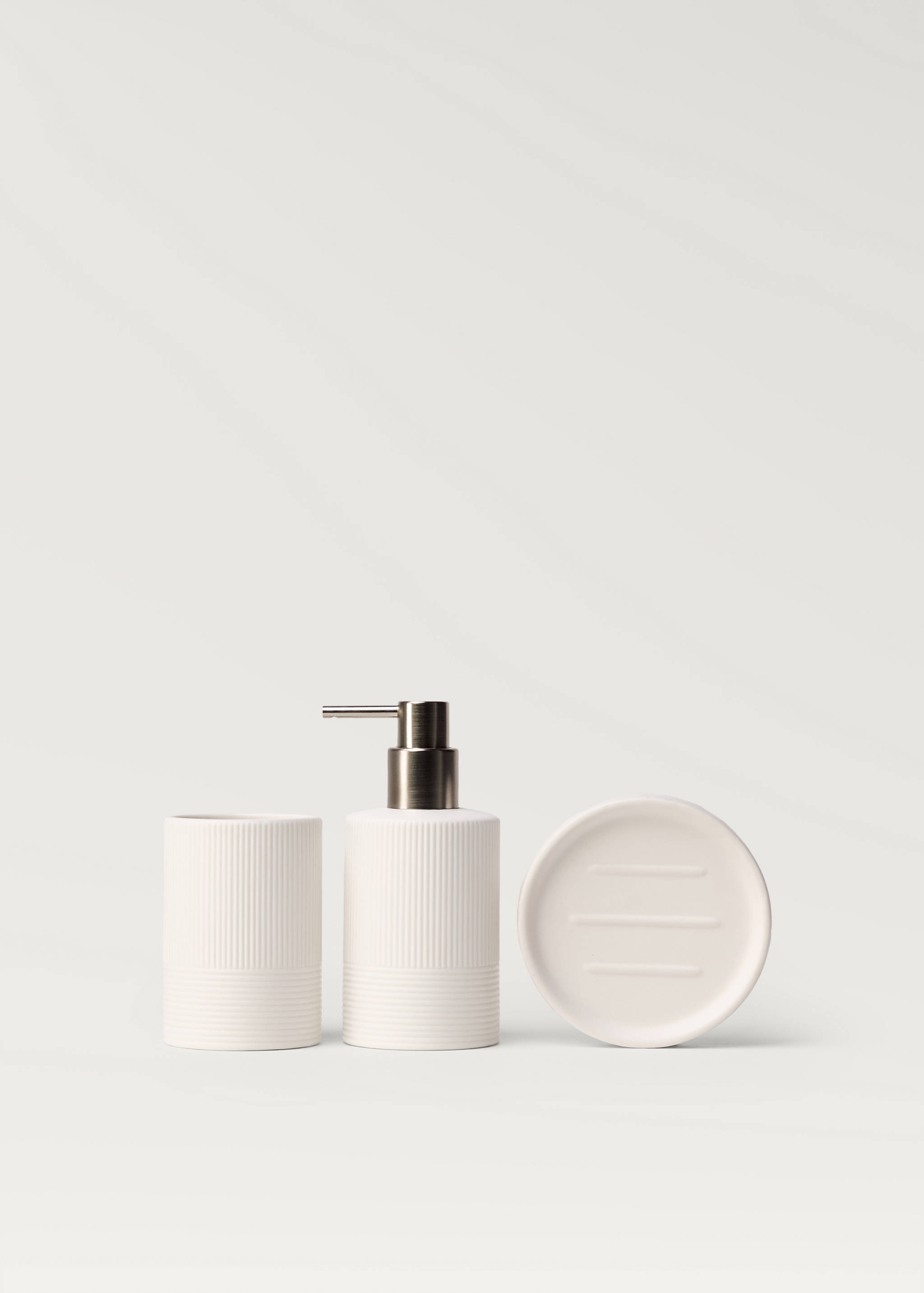 Stoneware soap dispenser with relief - Details of the article 3