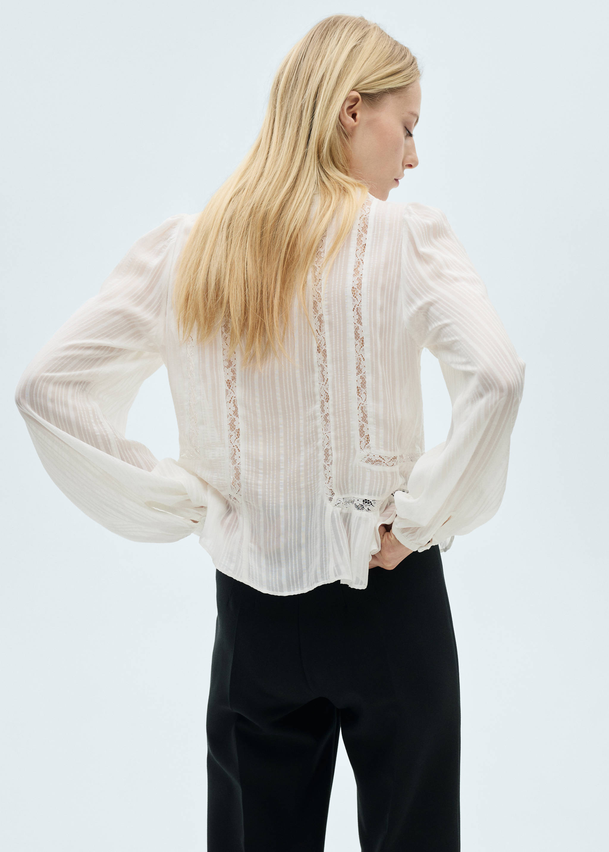 Blouse with ruffles and lace details - Reverse of the article