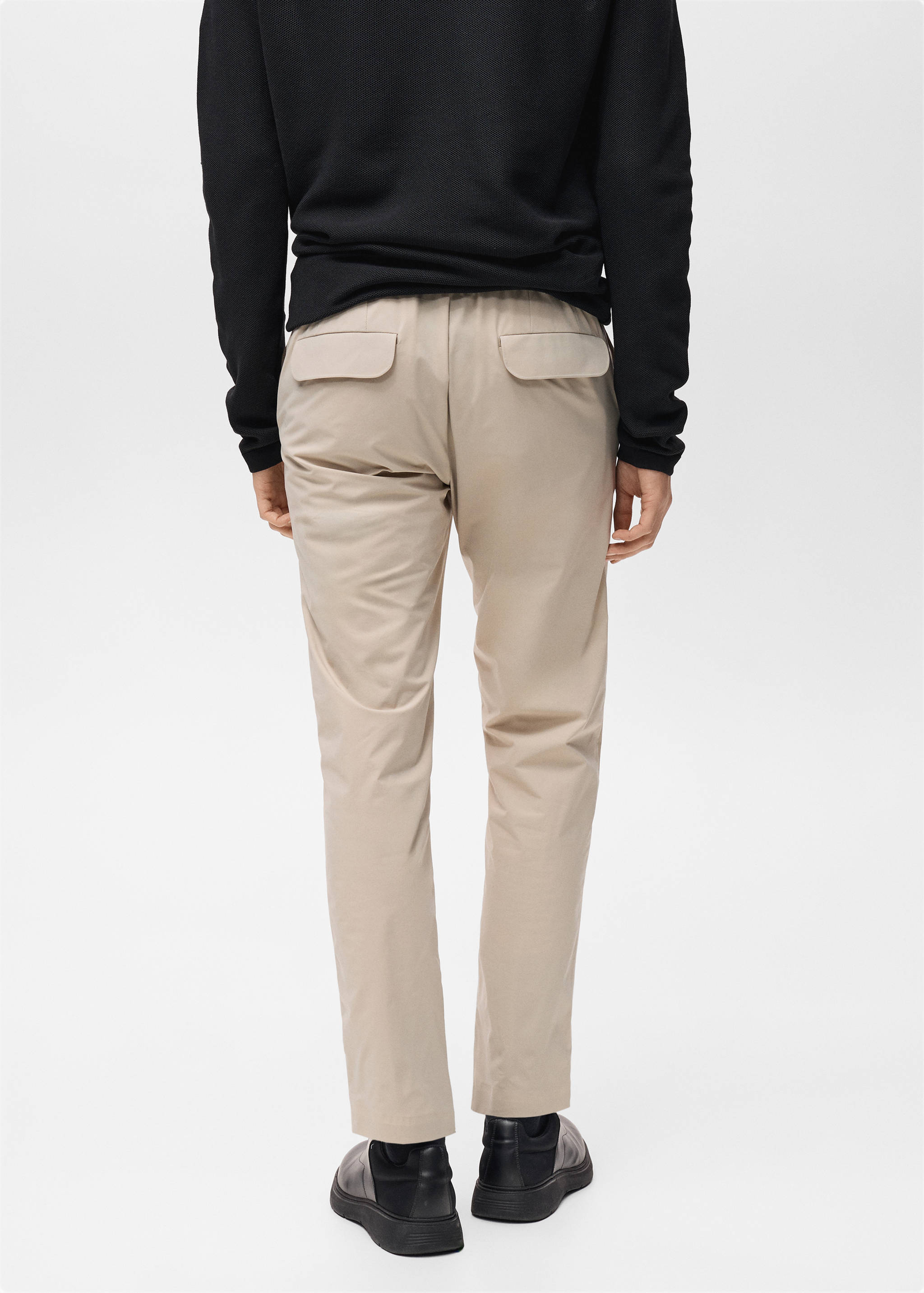 Stretch fabric slim-fit pants with drawstring - Reverse of the article