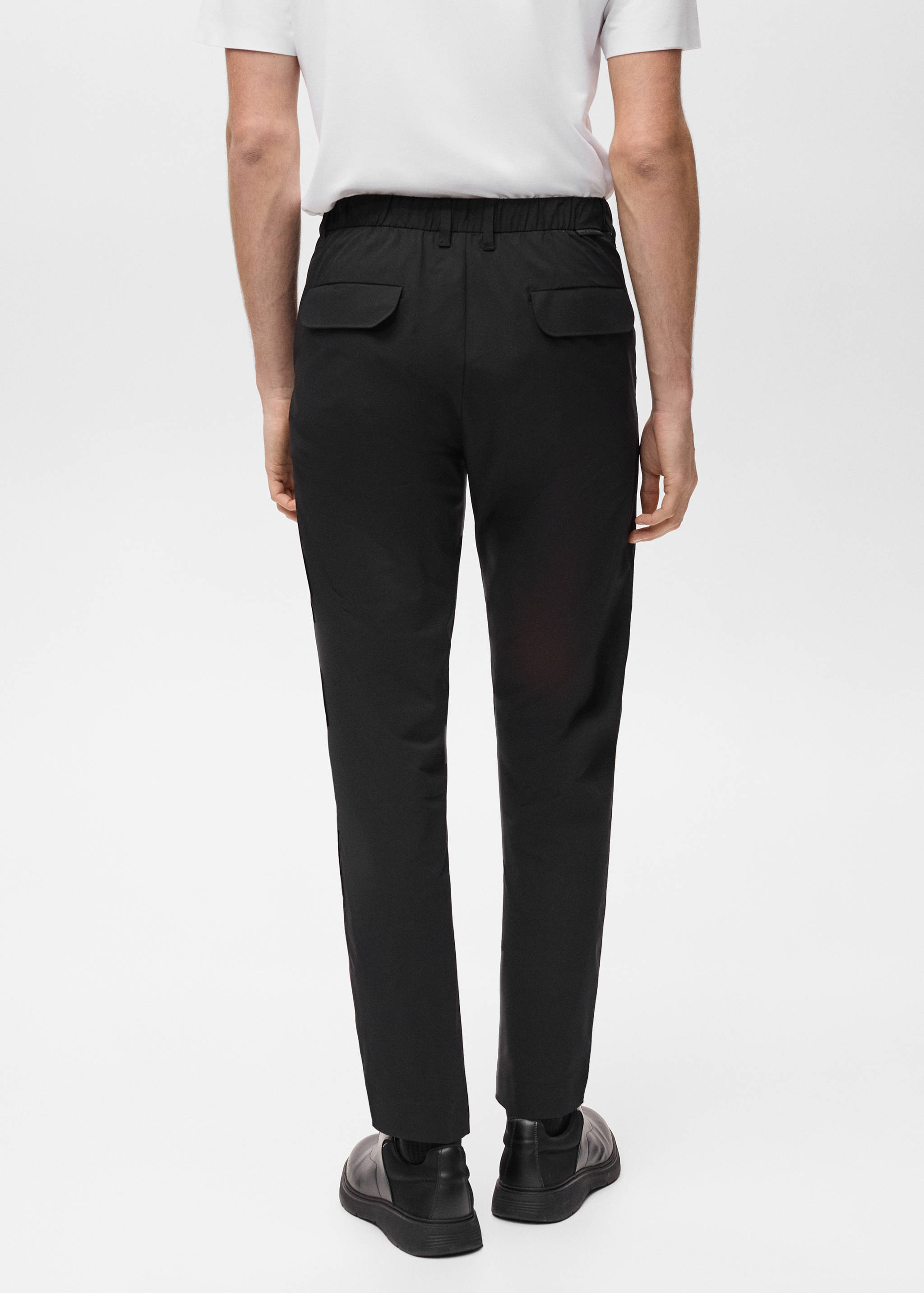 Stretch fabric slim-fit pants with drawstring - Reverse of the article