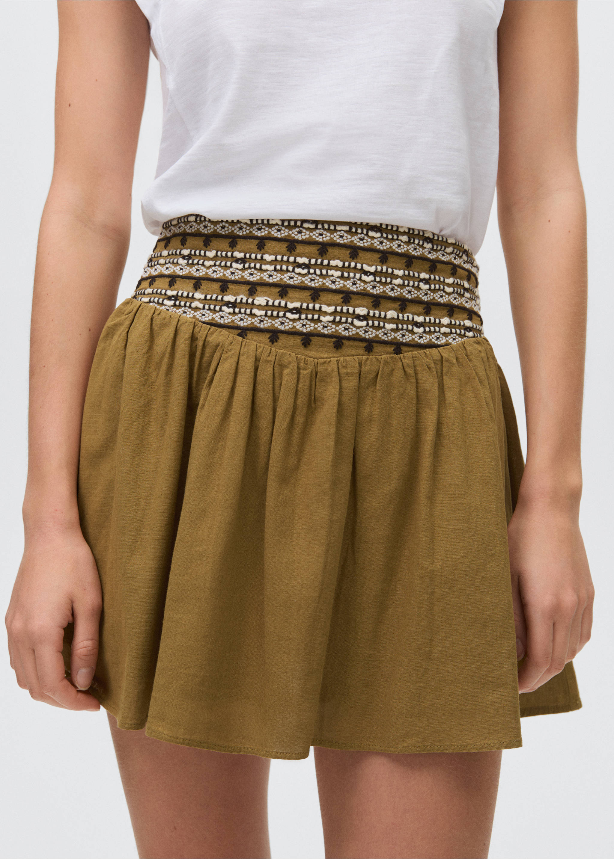 Short skirt with embroidered waist - Details of the article 3, Olive Green. Ref: 87065726-00.