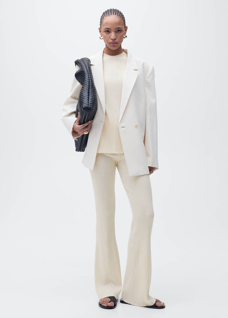 Flared rib-knit trousers — Ecru