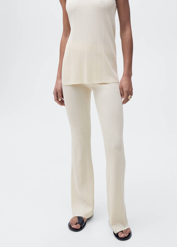 Flared rib-knit trousers — Ecru