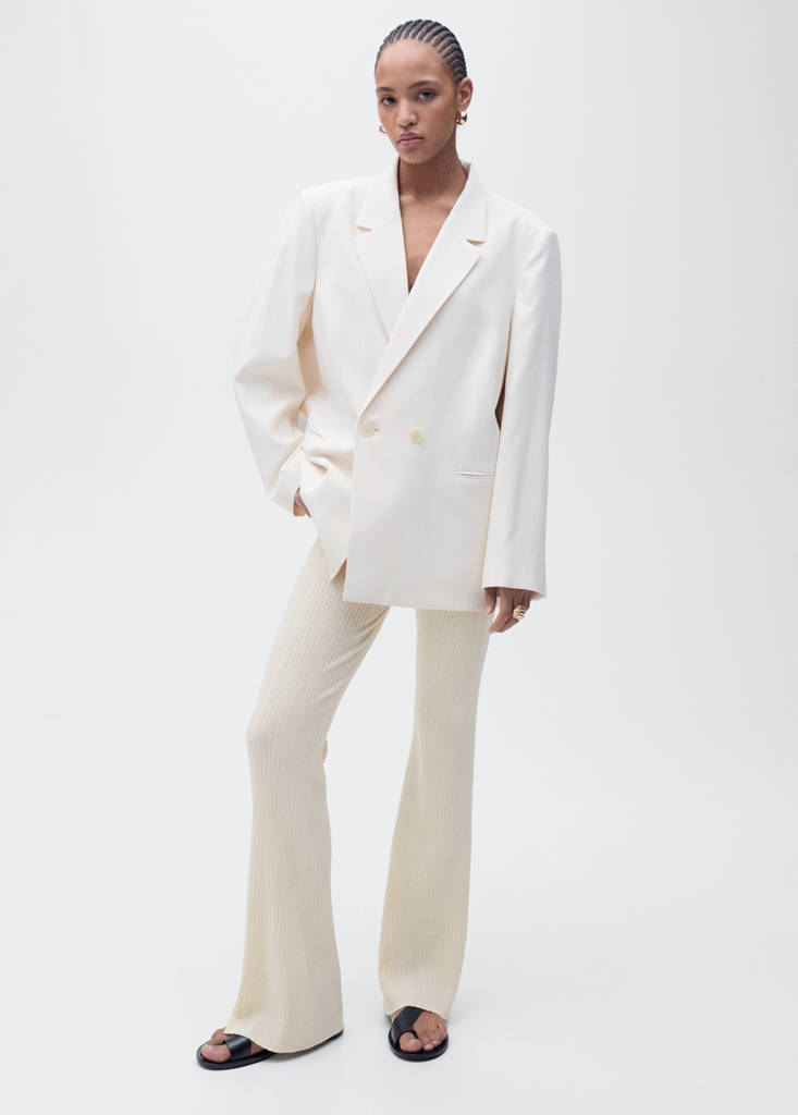 Flared rib-knit trousers — Ecru