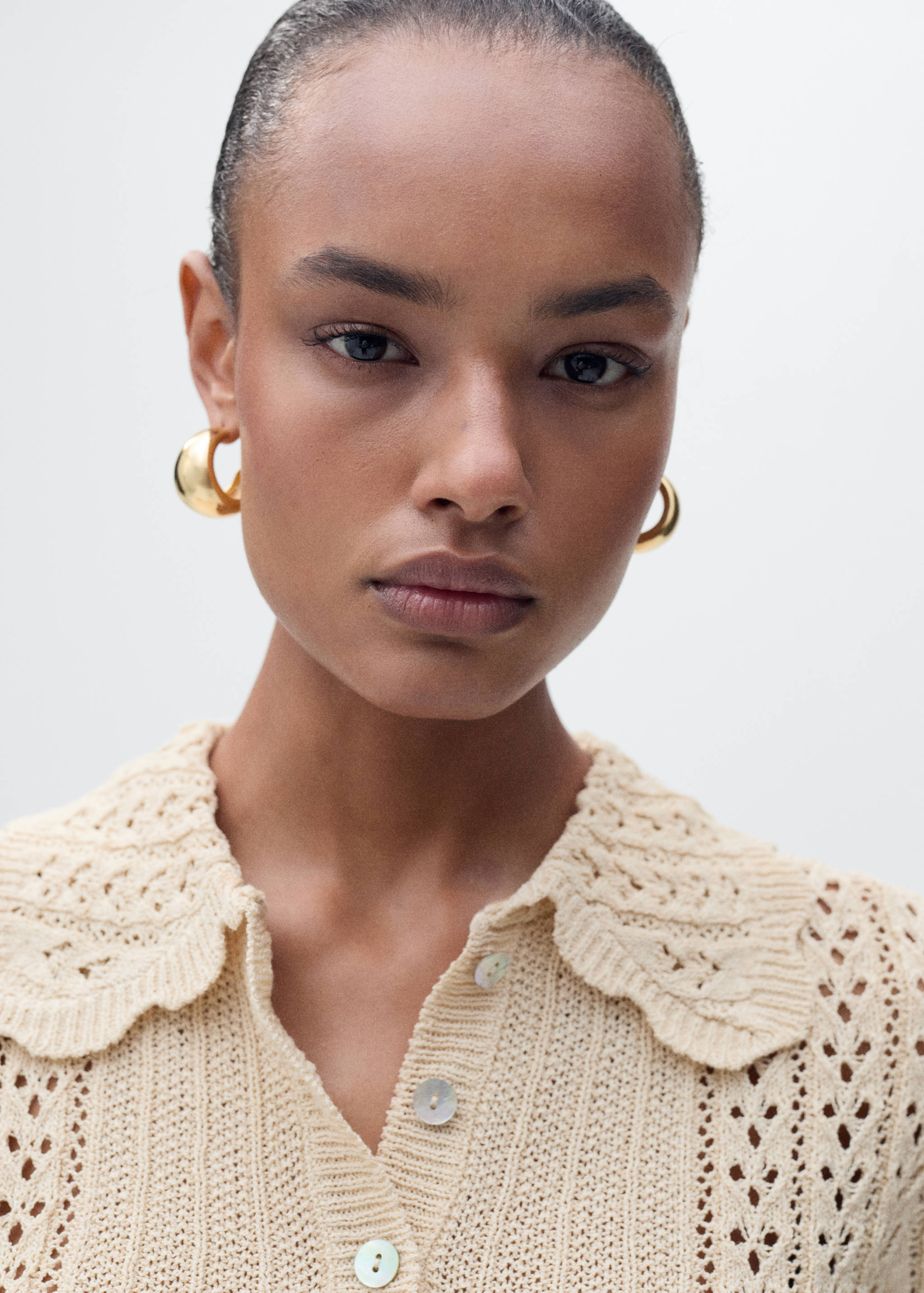 Openwork knitted polo-neck sweater - Details of the article 2