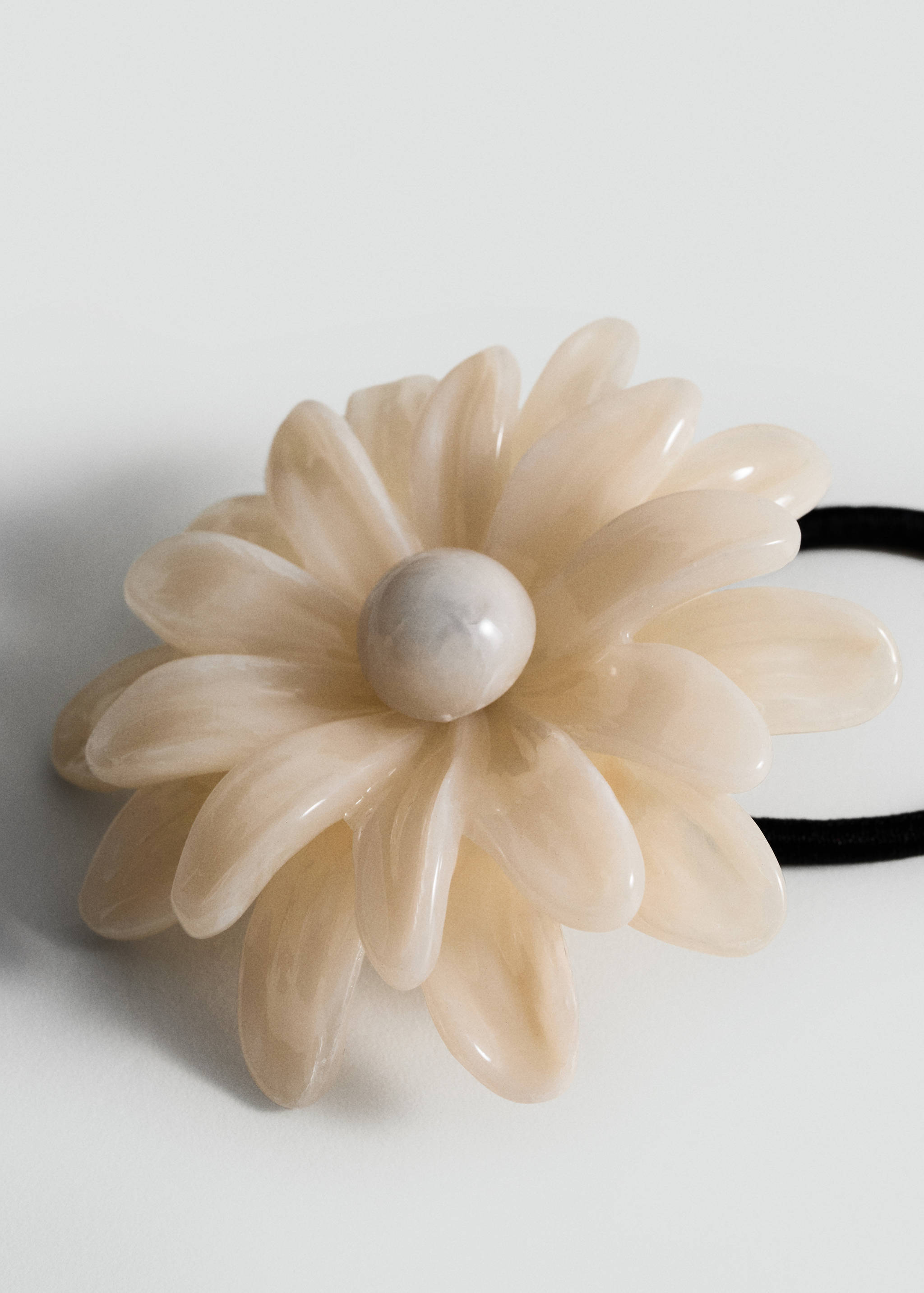 Gummi med blomdetalj - Bild av mittparti