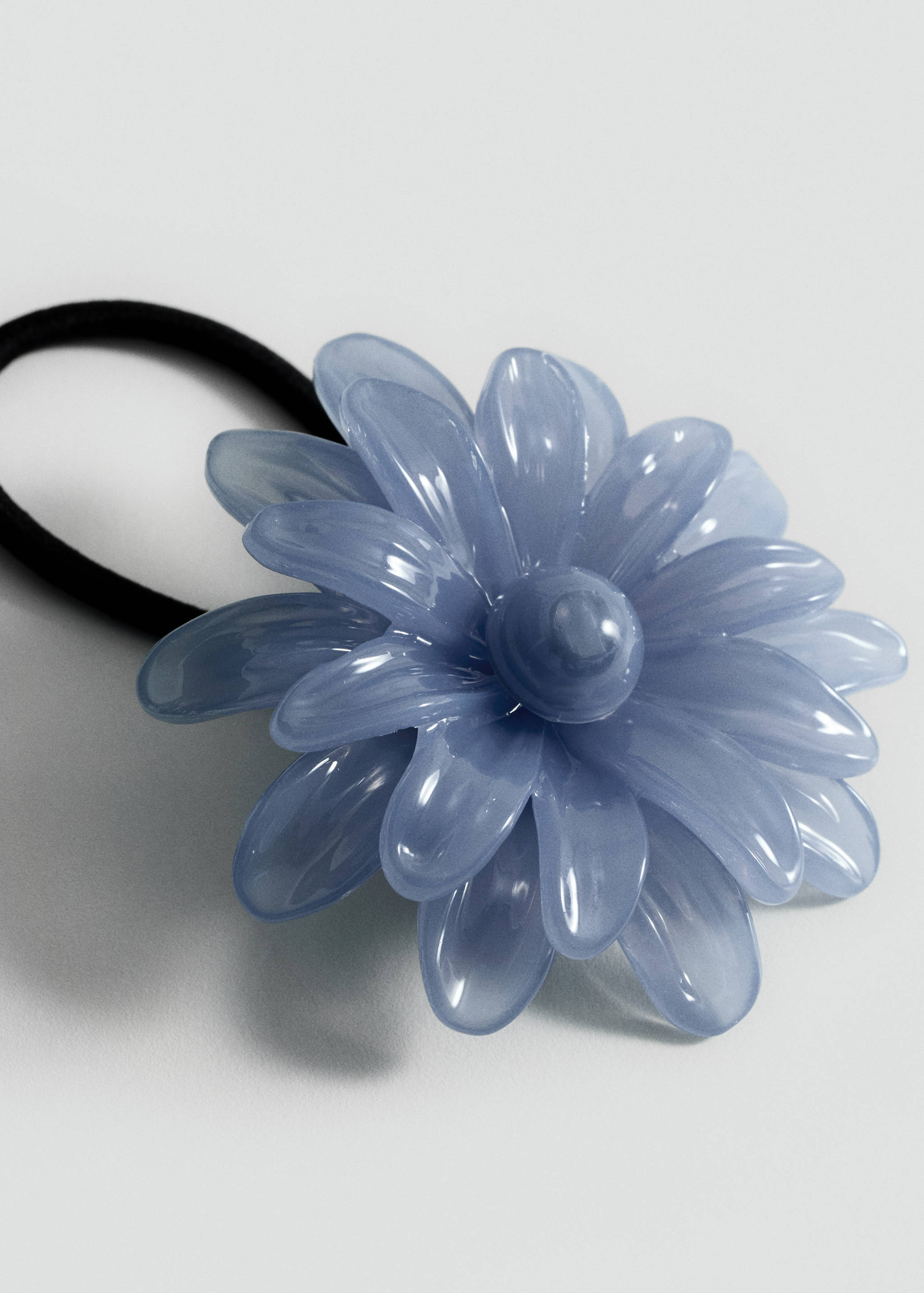 Gummi med blomdetalj - Bild av mittparti