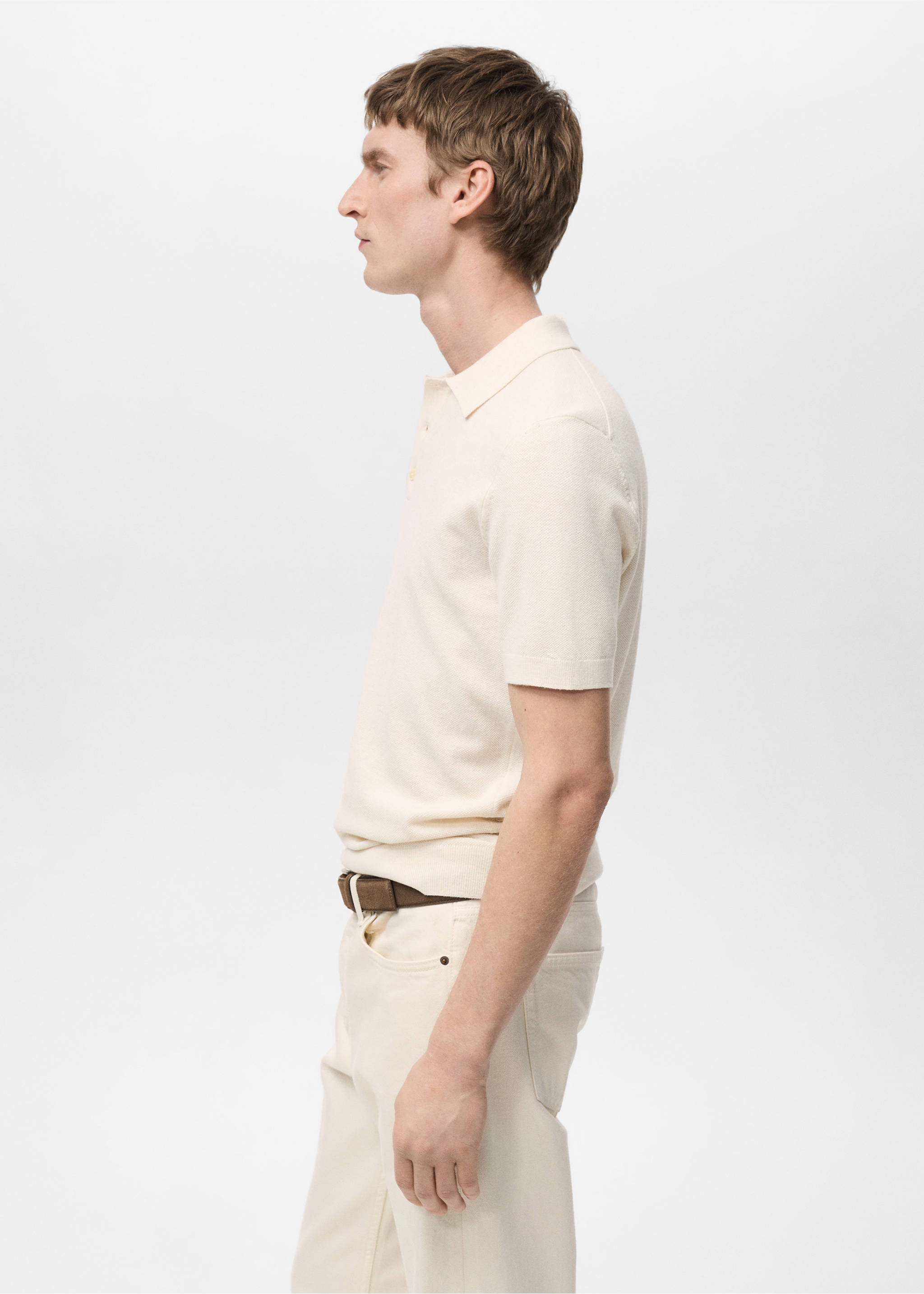 Structured knitted slim-fit polo shirt - Details of the article 1, Ivory White. Ref: 87065932-00.