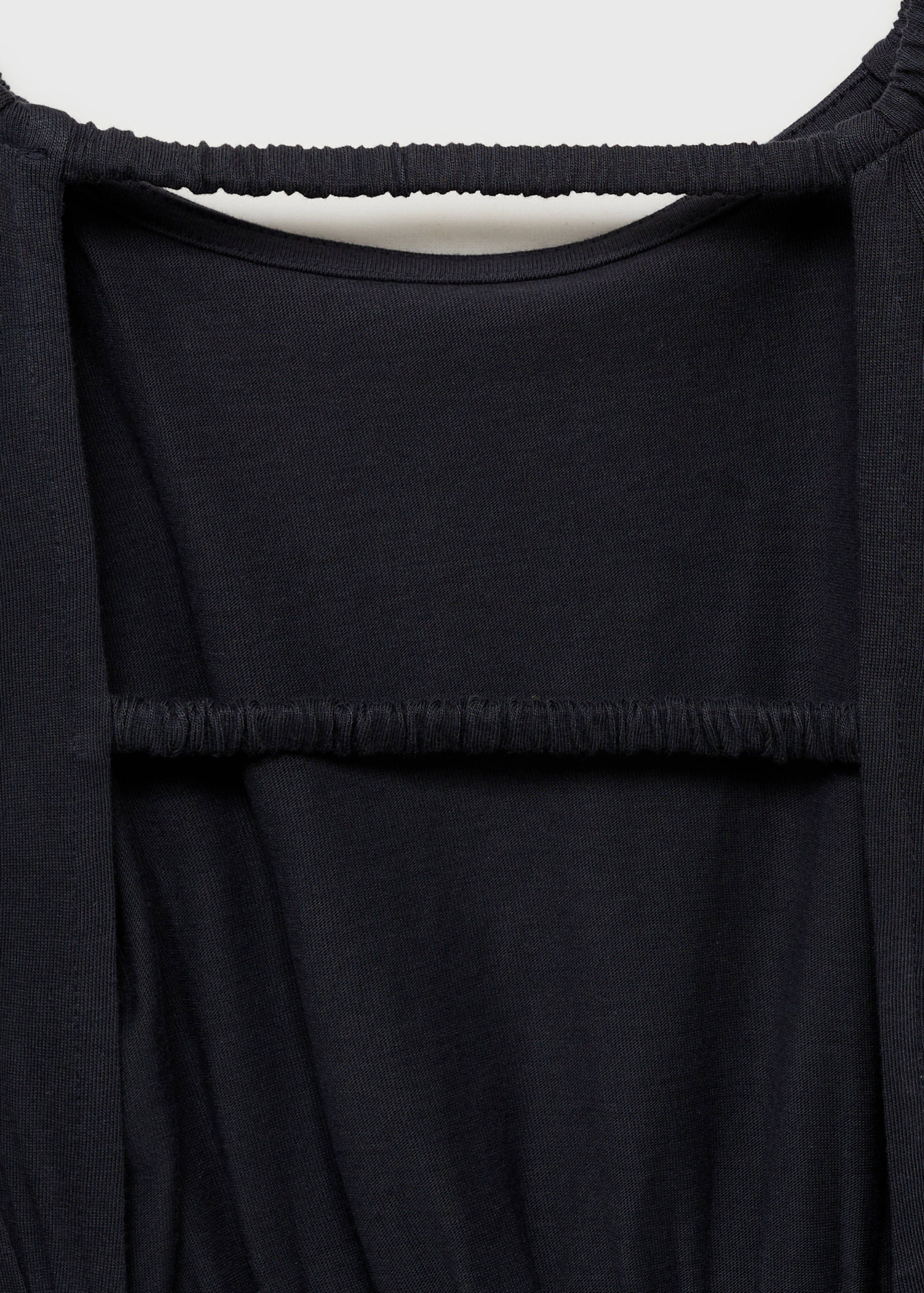 Macacão comprido com abertura nas costas - Pormenor do artigo 8