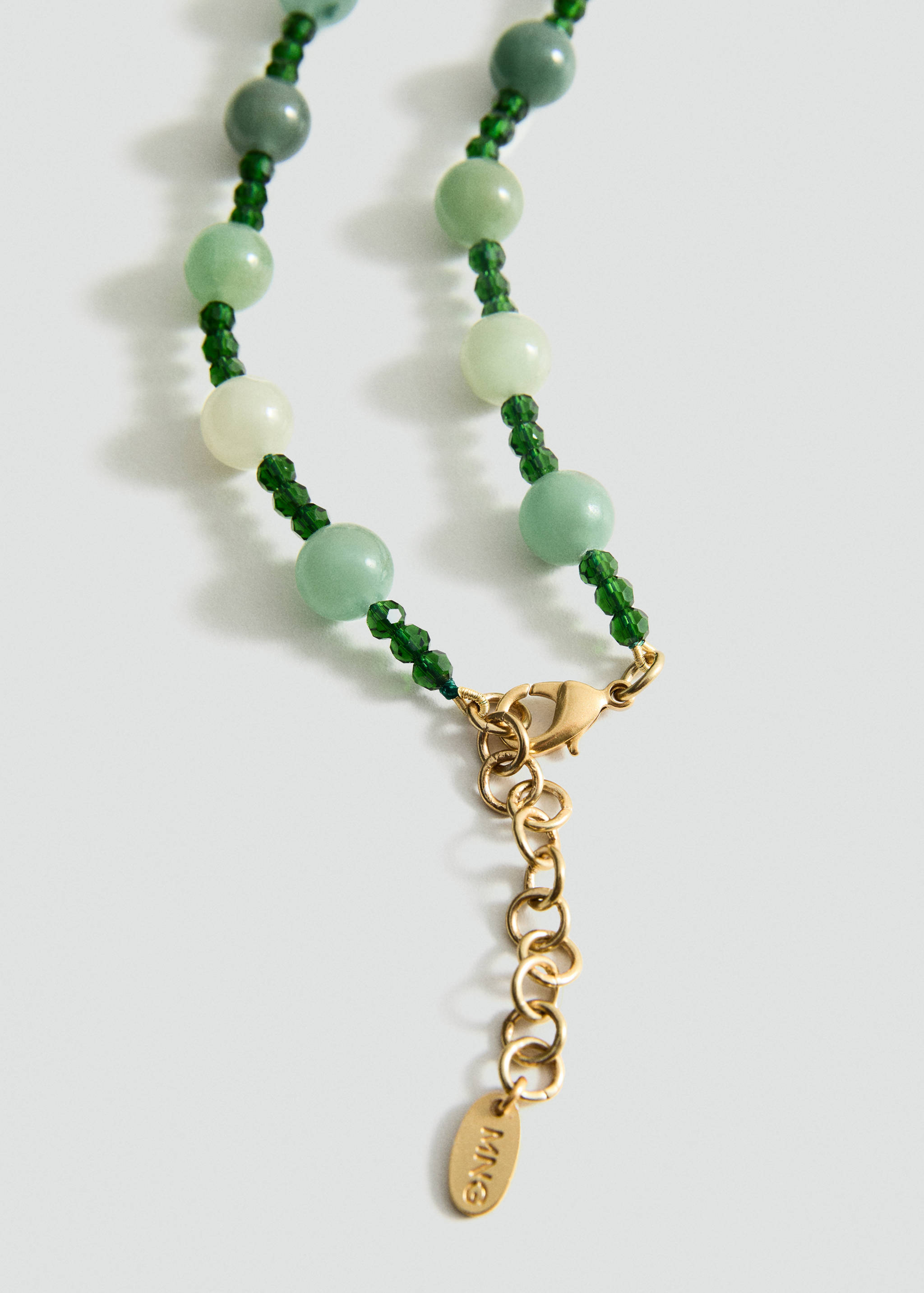 Kalung bola dengan detail bunga batu - Tampilan Sedang