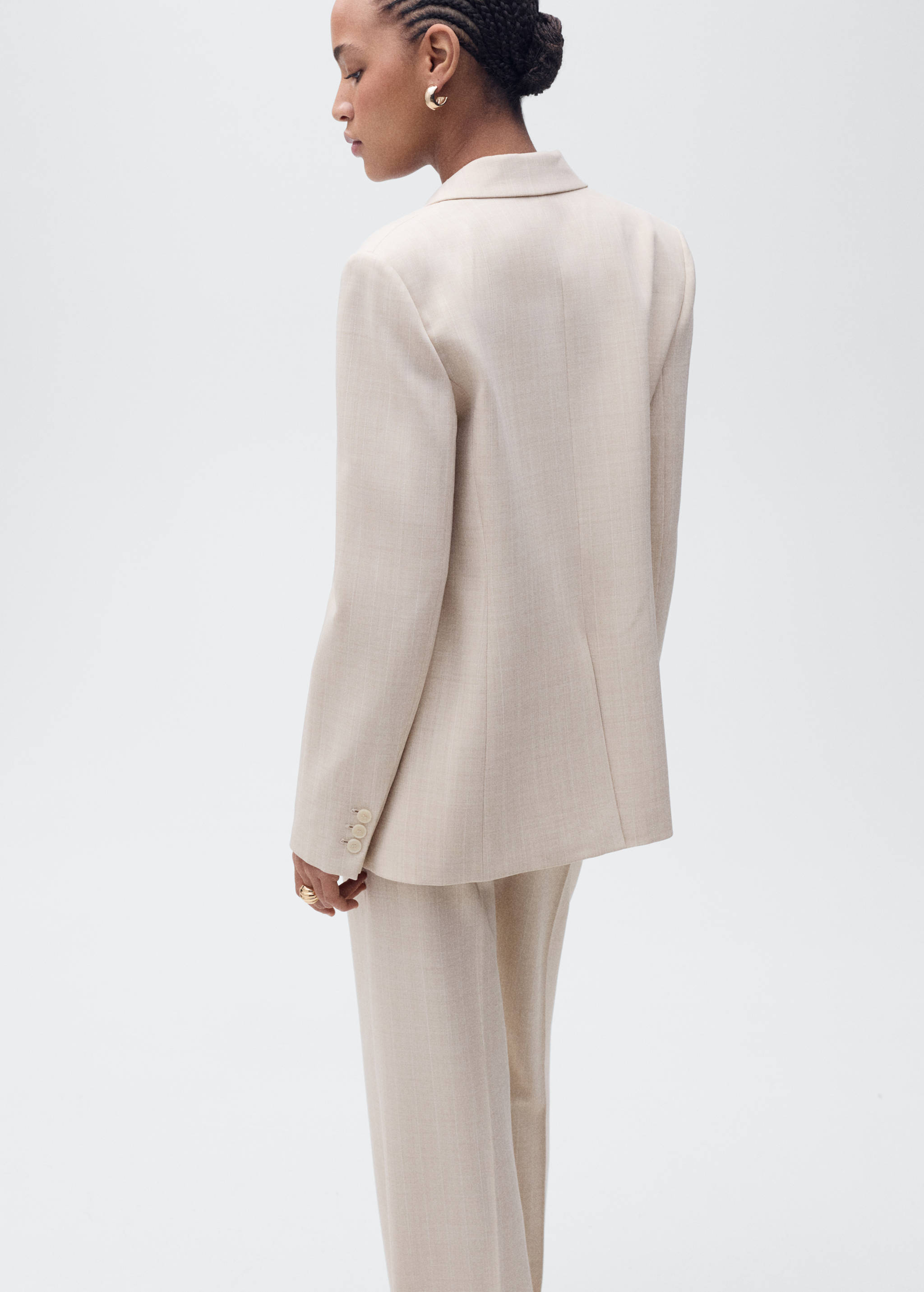 Blazer de fato com estrutura - Verso do artigo