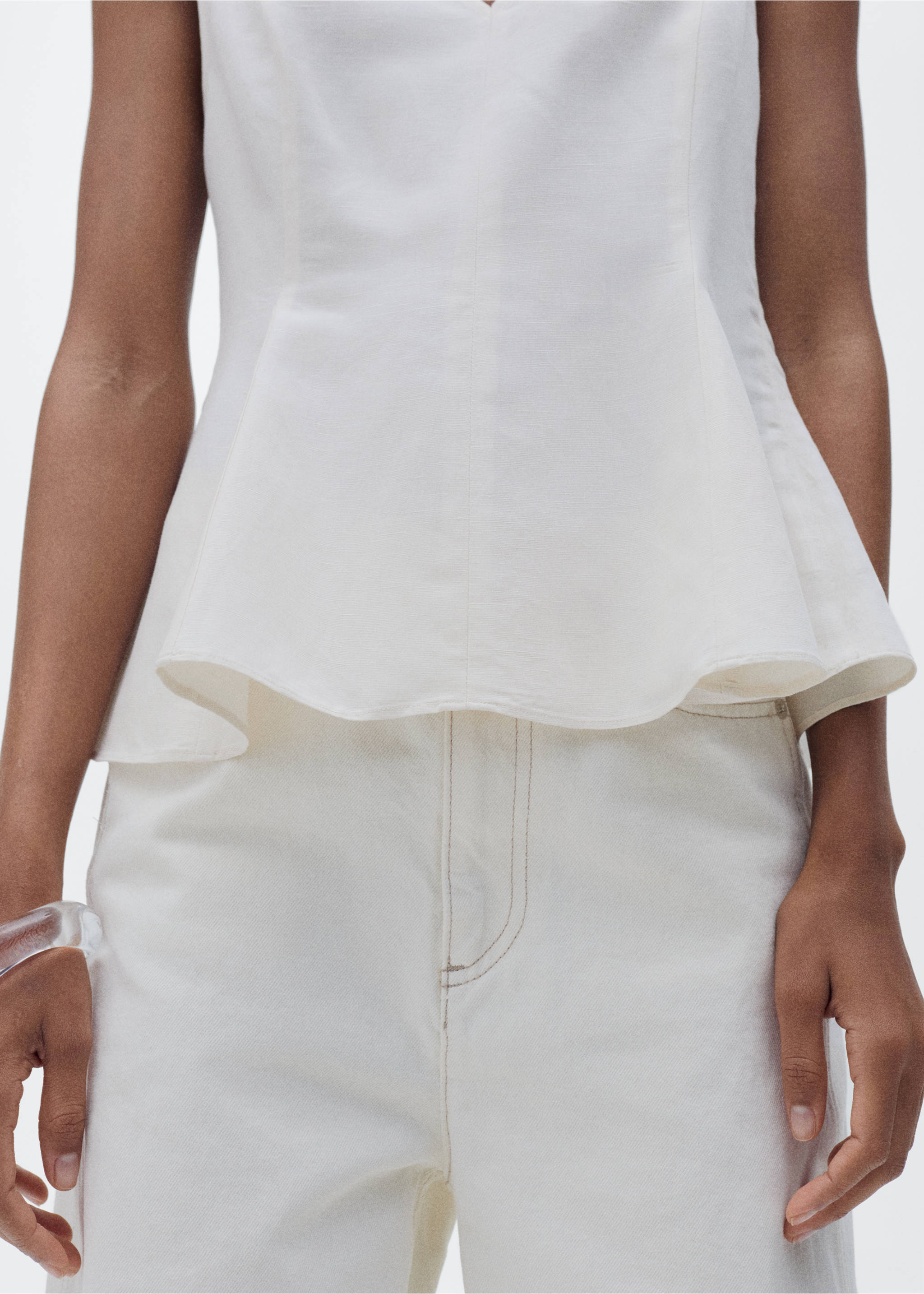 White sleeveless peplum top in a cropped headless view., Ecru. Ref: 87067179-00.