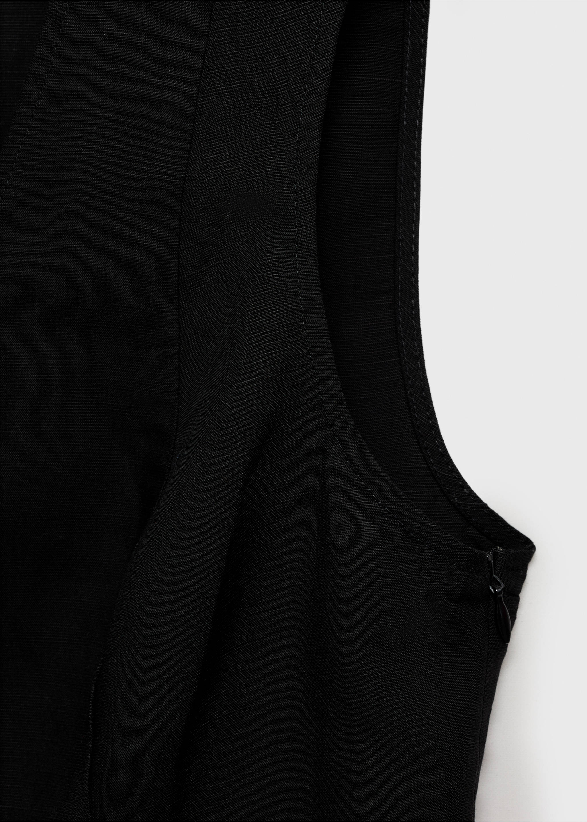 Close-up of a black top showing the side zip detail., Black. Ref: 87067179-00.