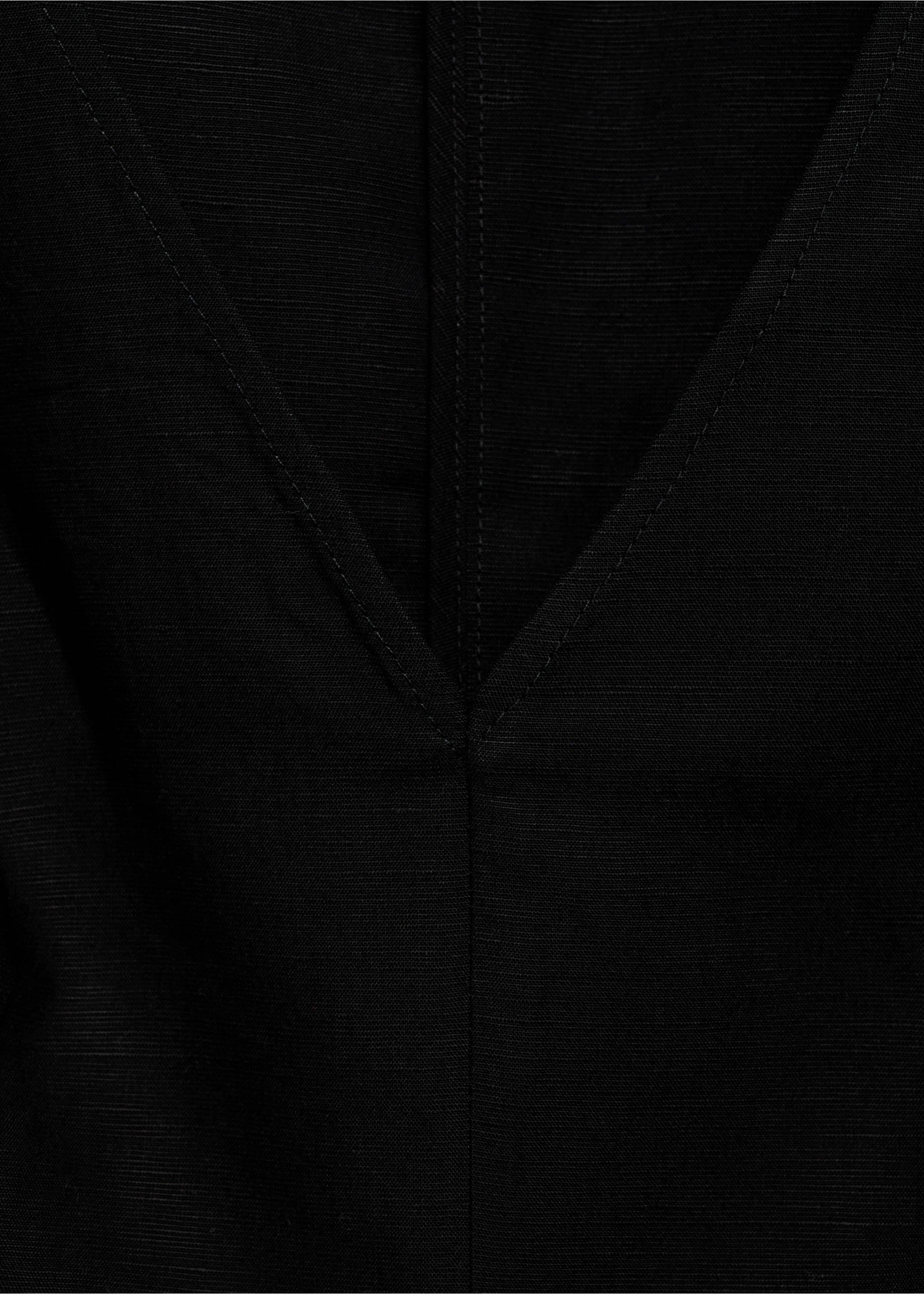 Close-up of the black top fabric and V-neckline., Black. Ref: 87067179-00.