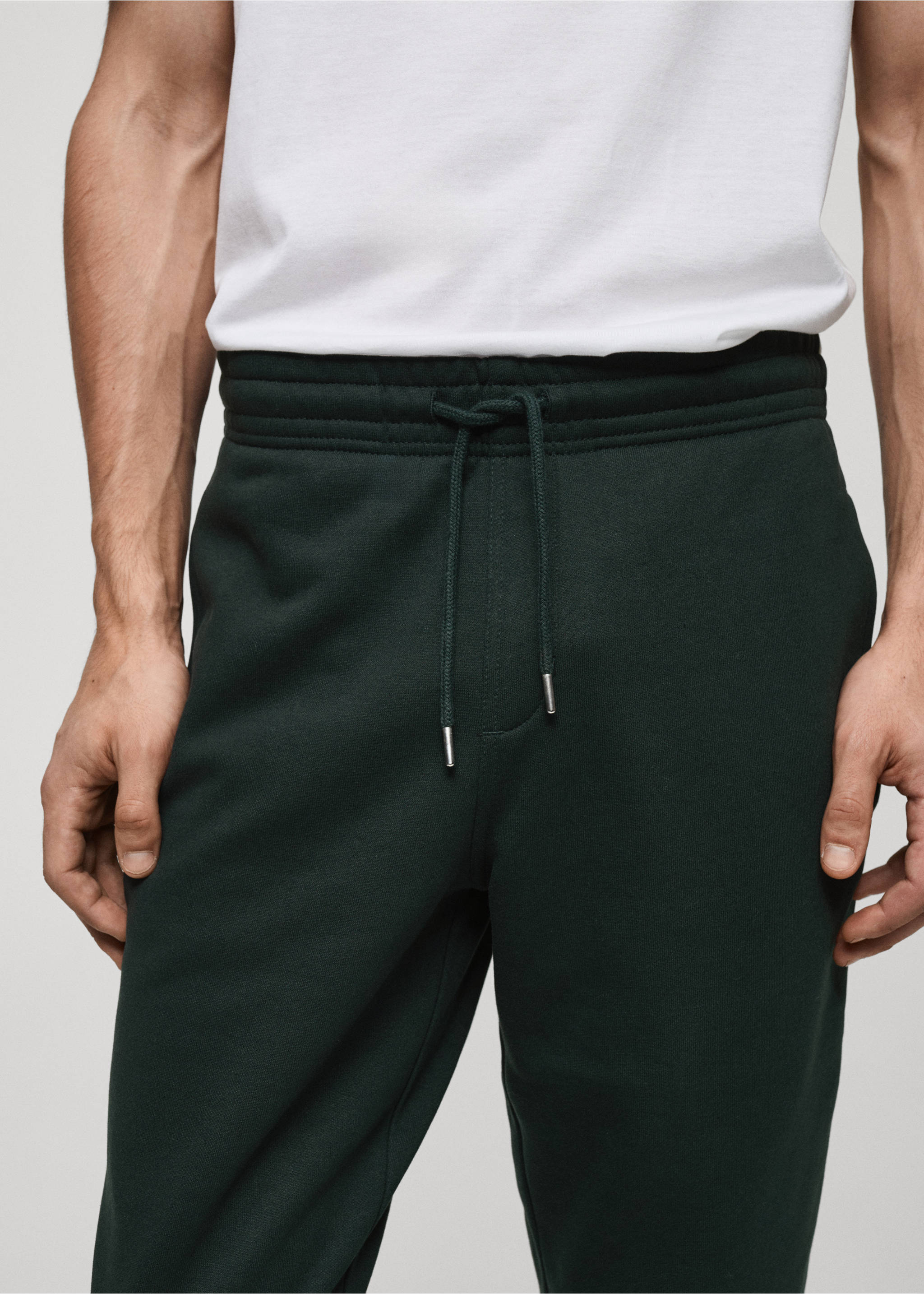Brushed joggers with elastic waistband - Details of the article 1, Green. Ref: 87070600-00.