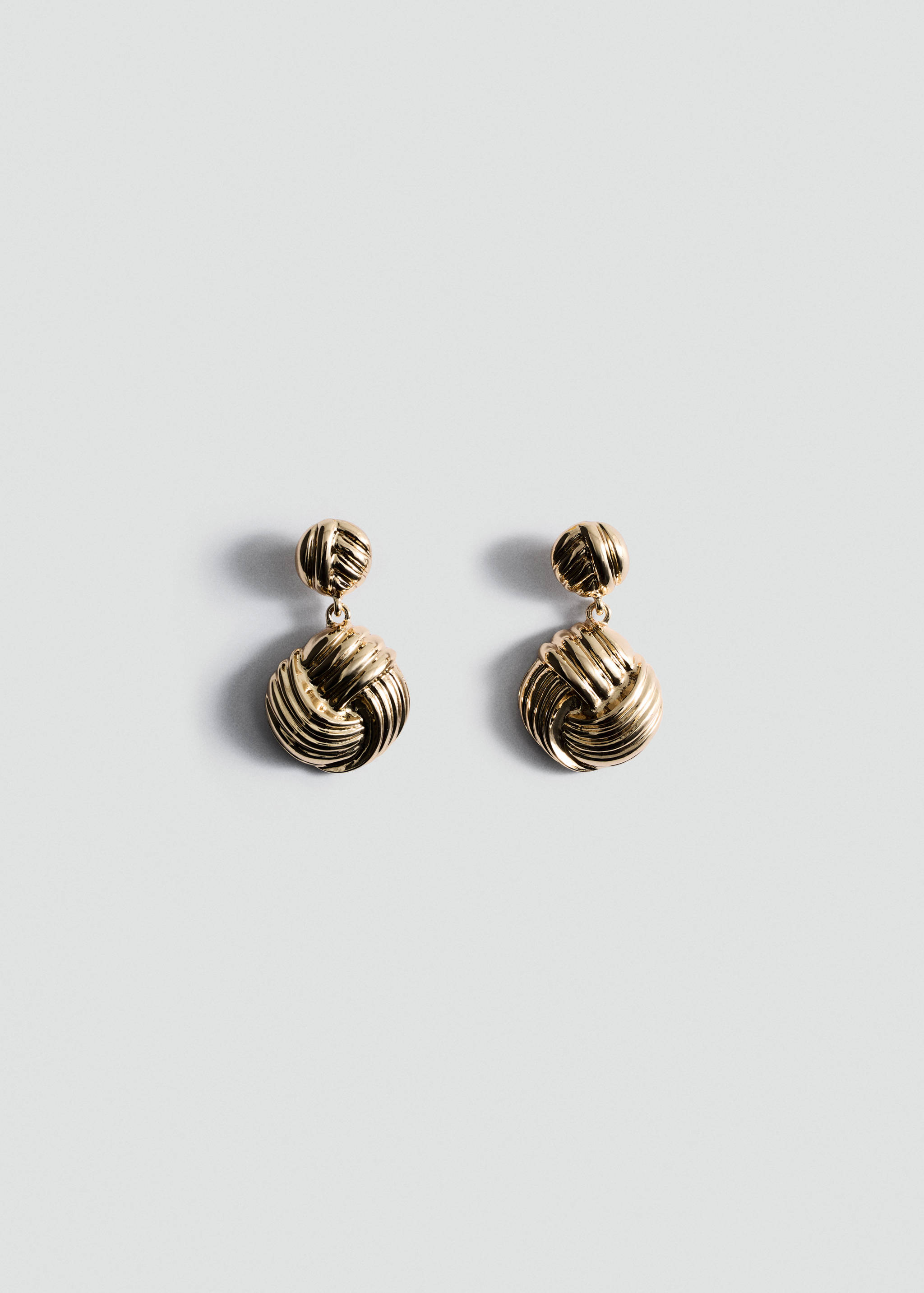 Intertwined design earrings - Article without model
