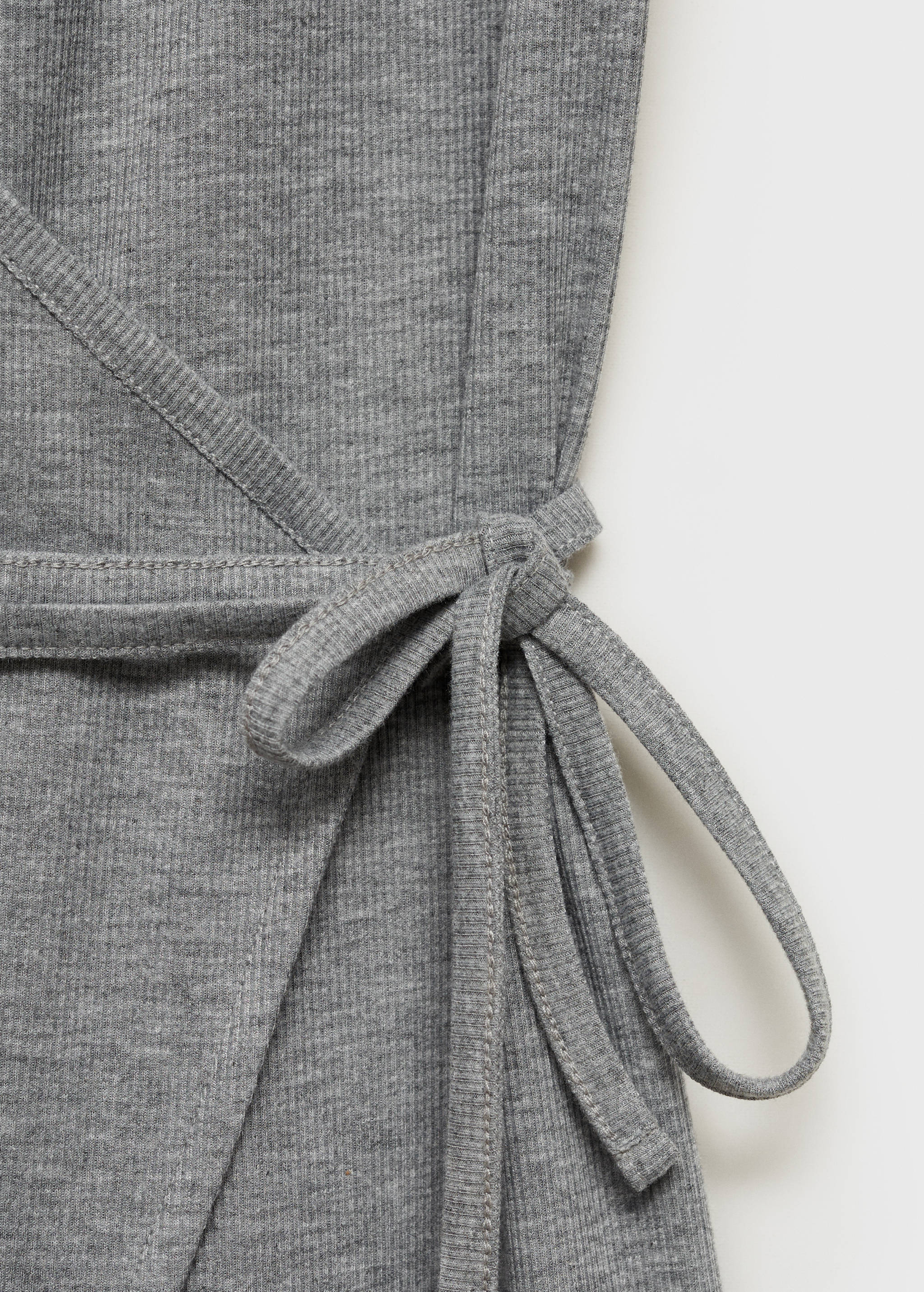 Rebrasta vesta s mašnom - Detalji artikla 0