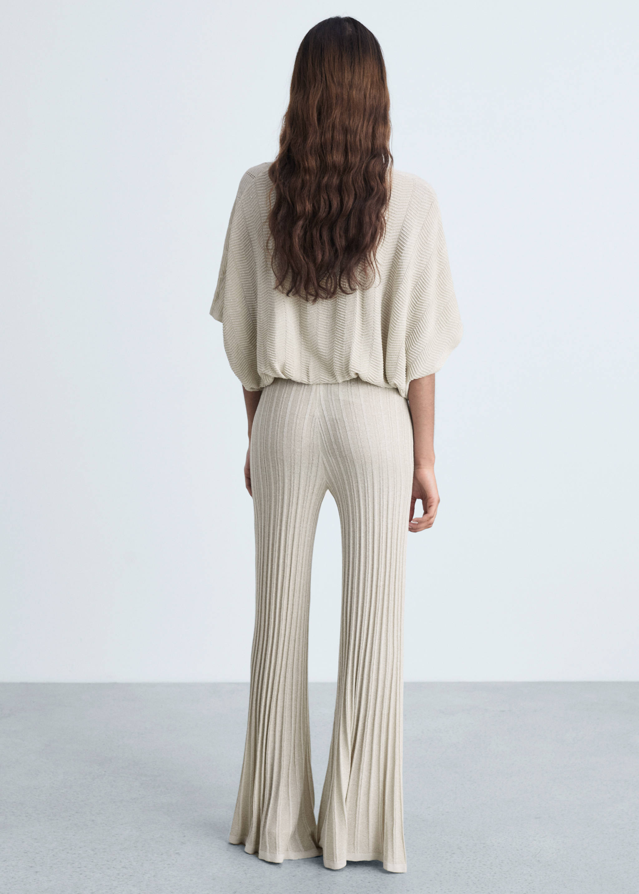 Flared knitted trousers - Reverse of the article